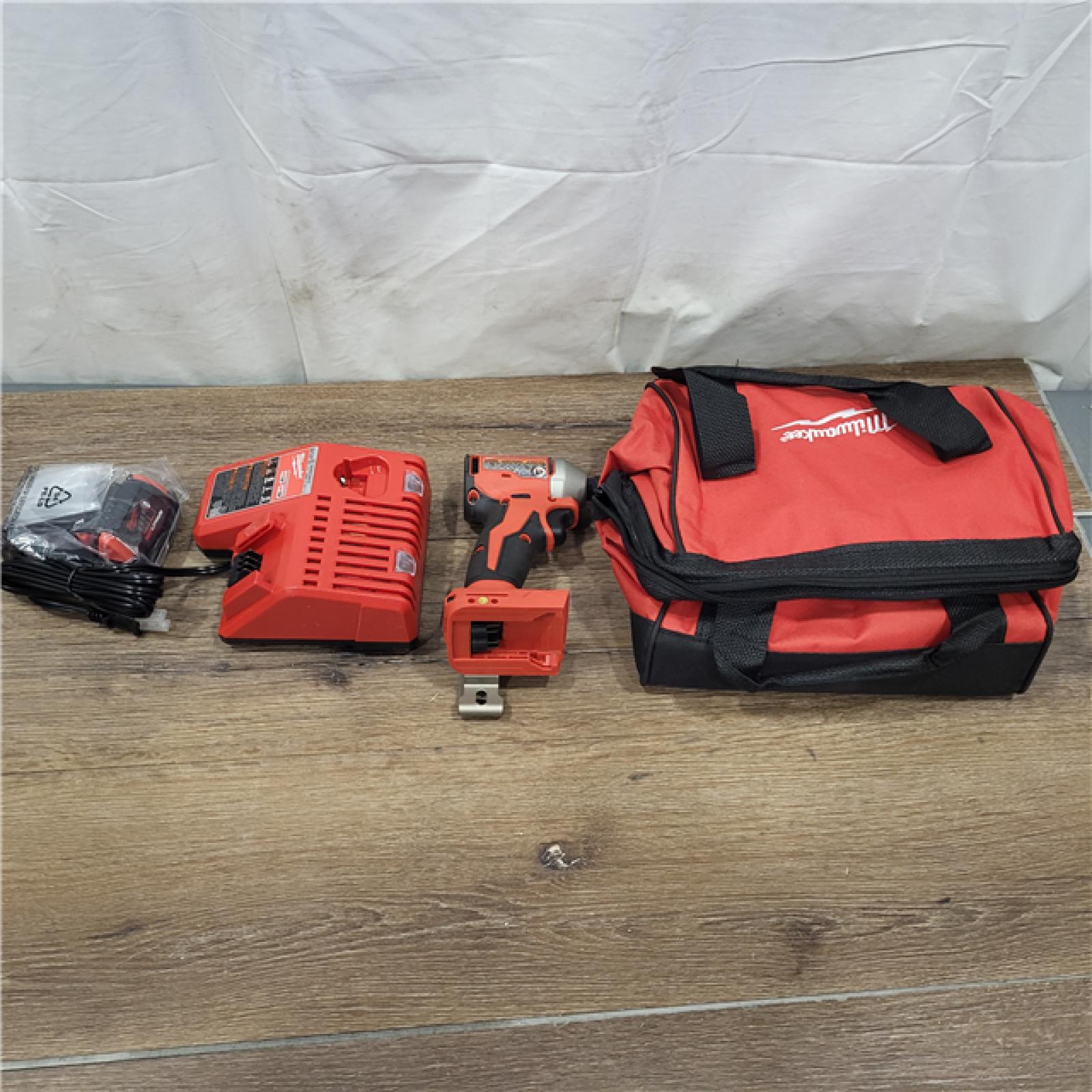 AS-IS Milwaukee M18 Compact Brushless 1/4  Hex Impact Driver Kit