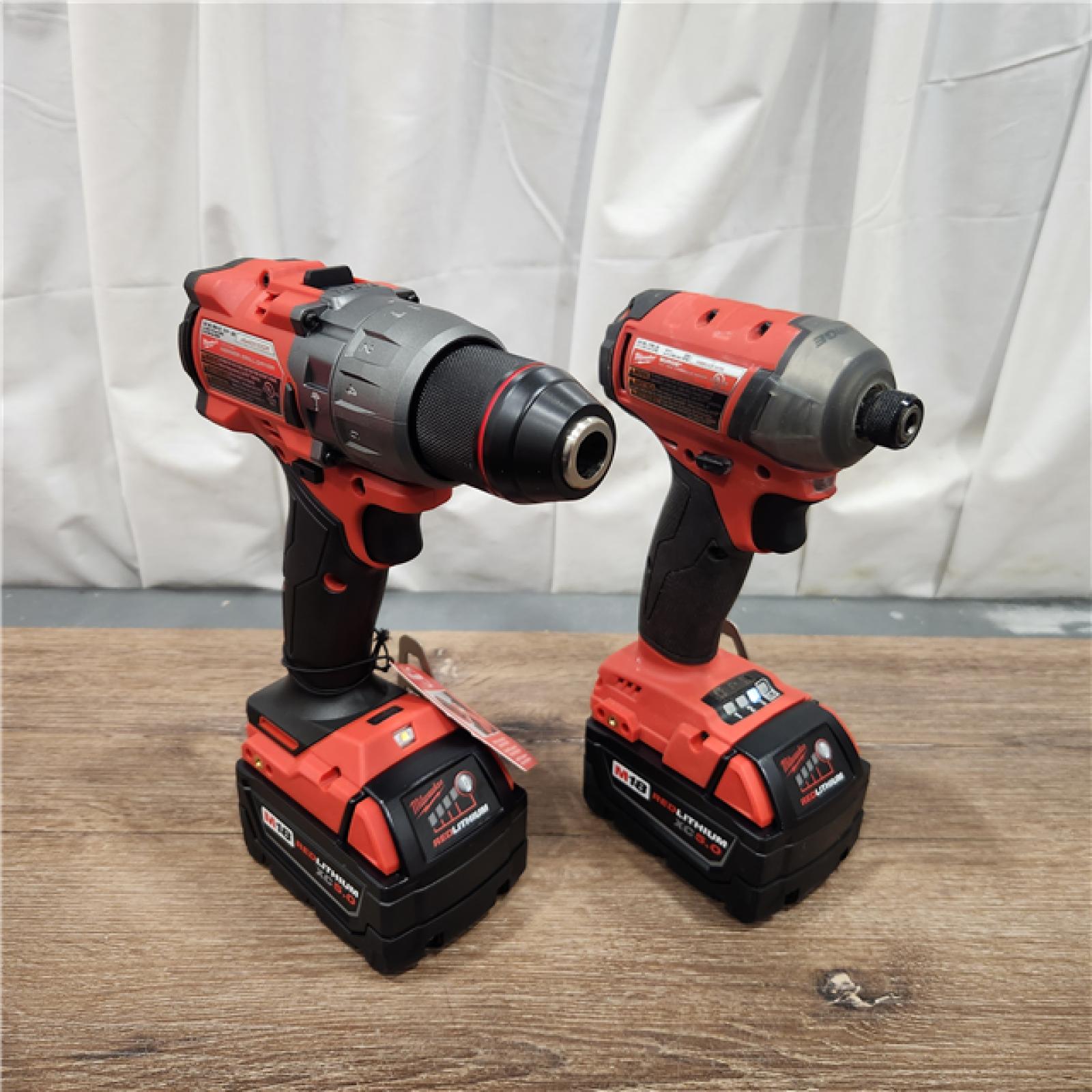 AS-IS Milwaukee M18 FUEL 18V Lithium-Ion Brushless Cordless Hammer Drill and Impact Driver Combo Kit (2-Tool) with 2 Batteries