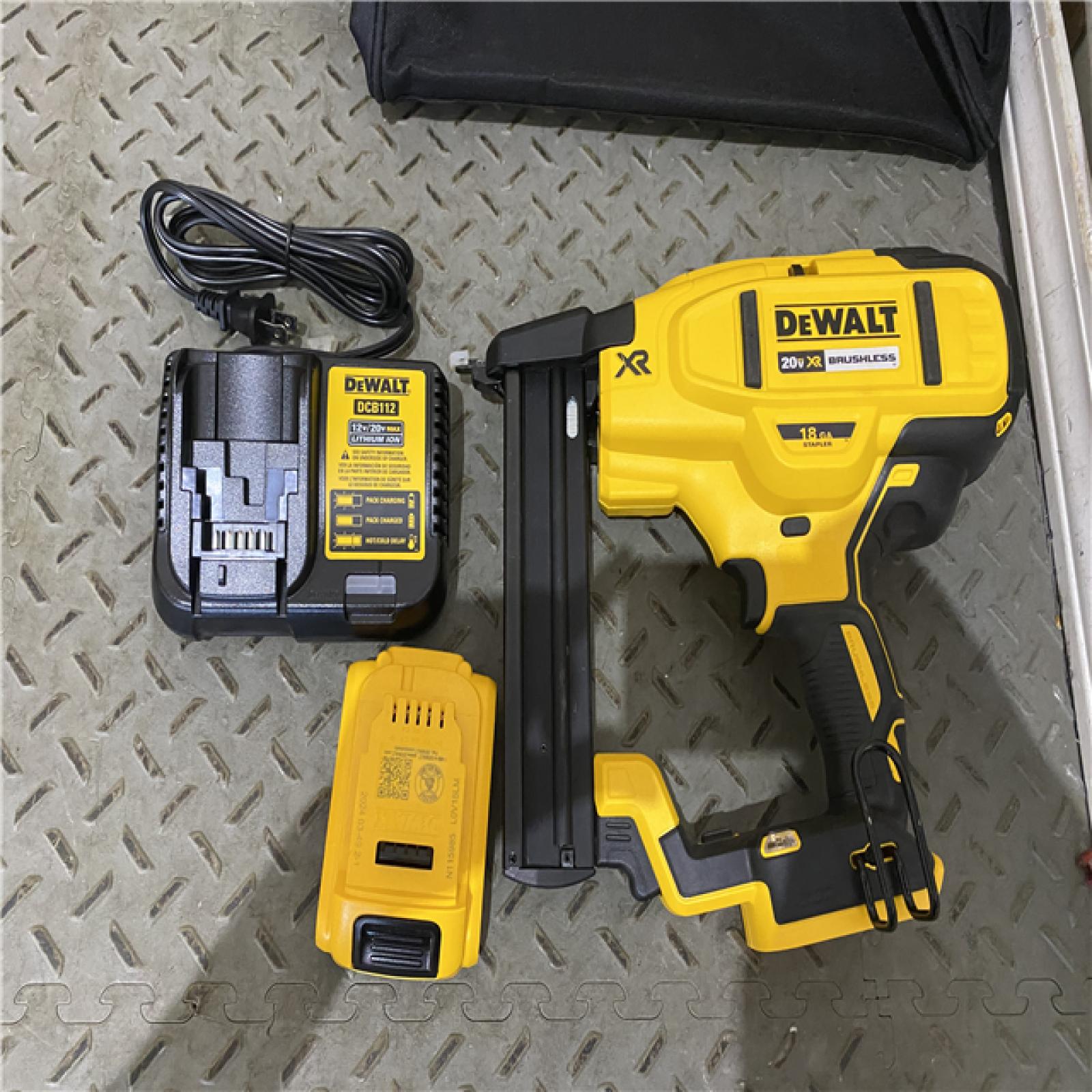 Houston location AS-IS DEWALT New in Box DEWALT DCN681D1 20V 18Ga Stapler Kit