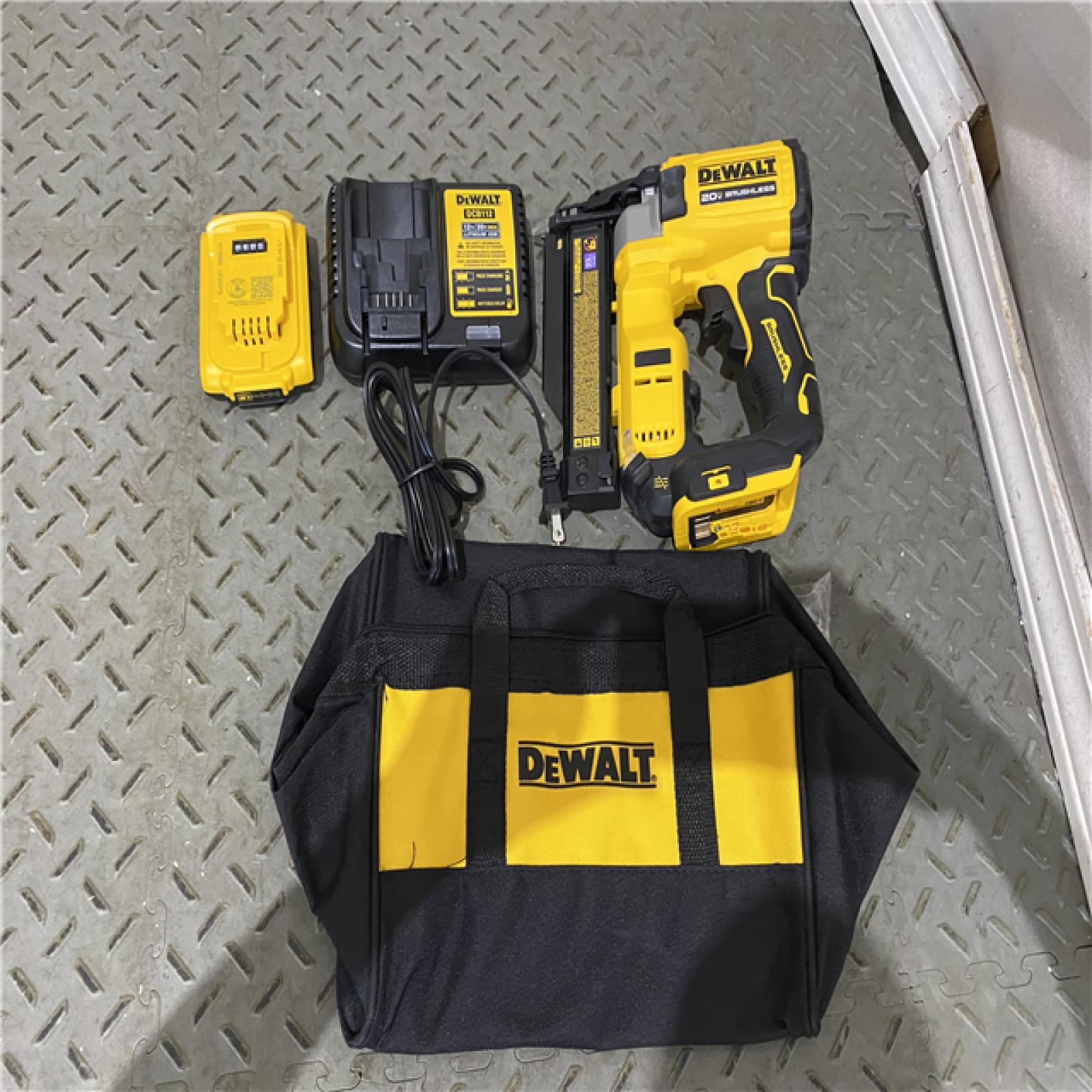 Houston location AS-IS DEWALT ATOMIC 20V MAX Lithium Ion Cordless 23 Gauge Pin Nailer Kit with 2.0Ah Battery and Charger