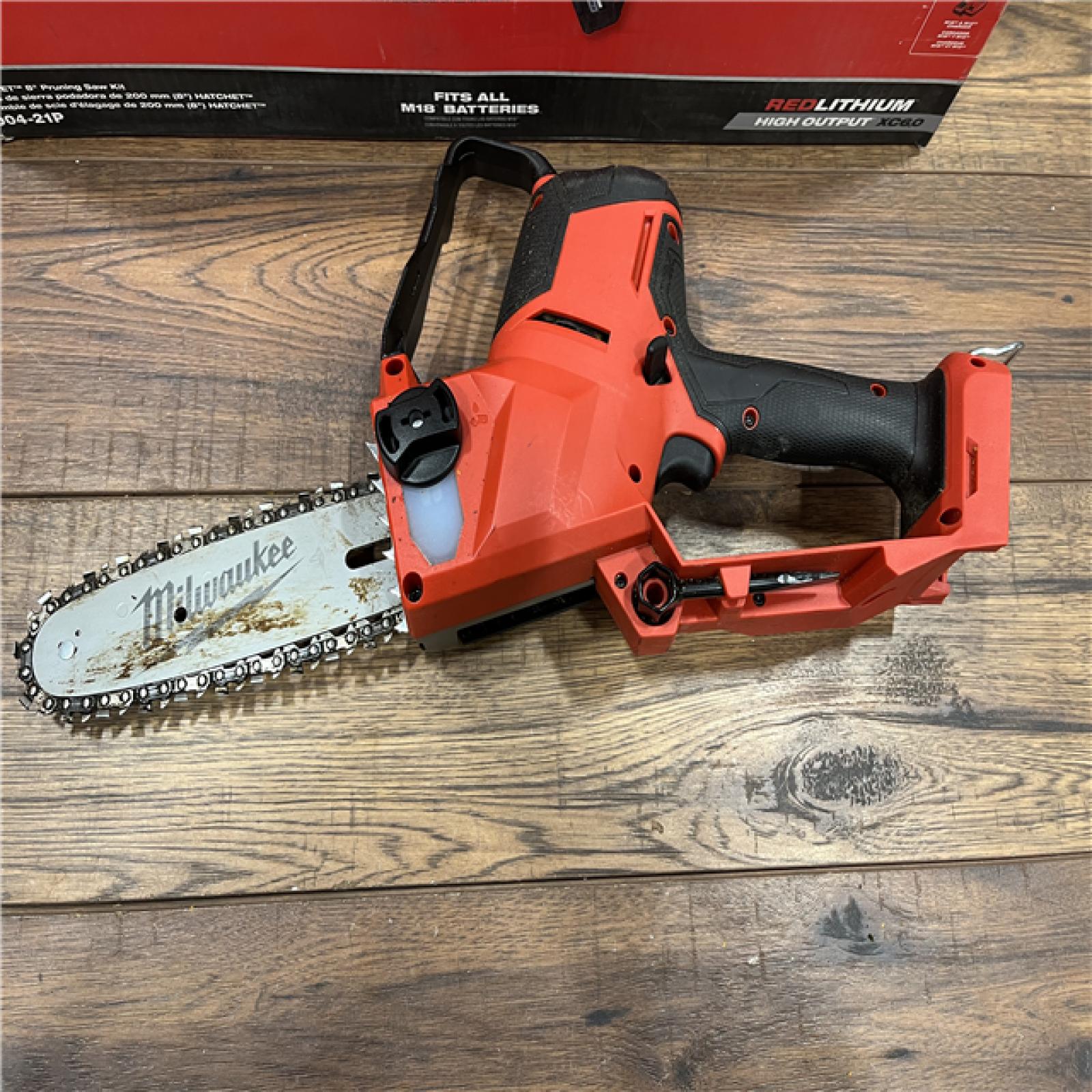 AS-IS MILWAUKEE M18 FUEL 8 in. 18V Lithium-Ion Brushless HATCHET Pruning Saw Kit with 6Ah High Output Battery and Charger