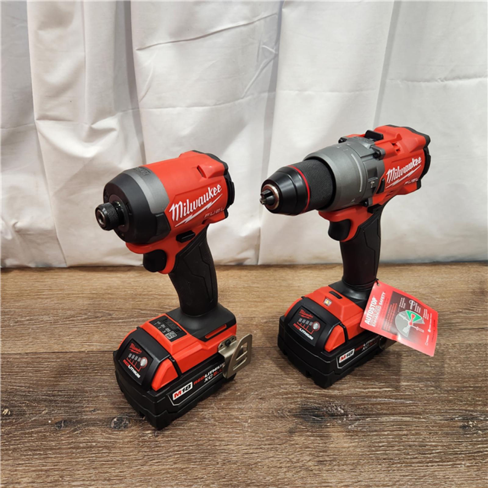 AS-IS Milwaukee M18 FUEL 18V Lithium-Ion Brushless Cordless Hammer Drill and Impact Driver Combo Kit (2-Tool) with 2 Batteries