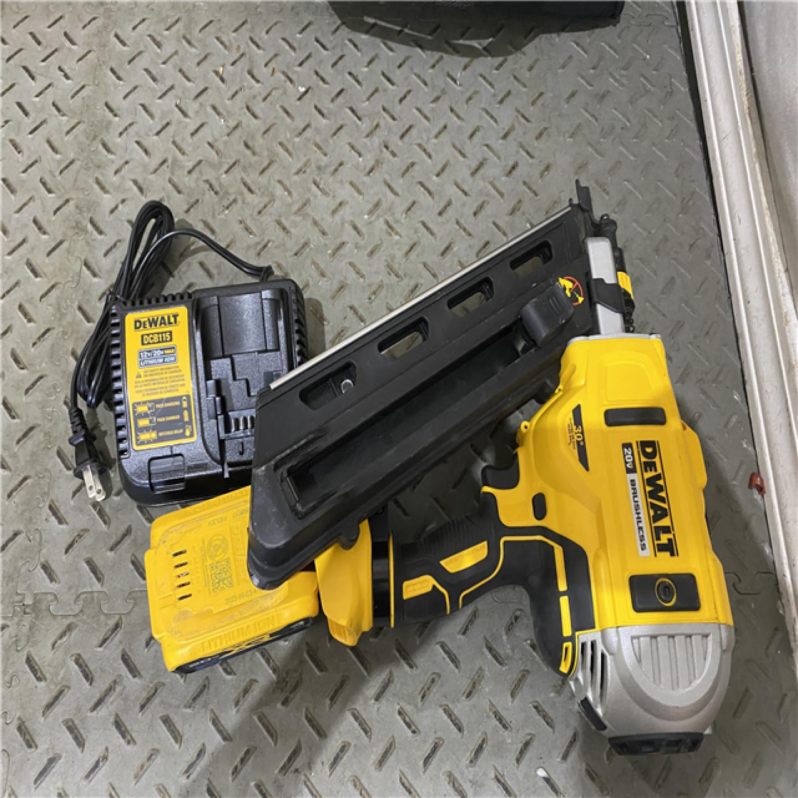 Houston location AS-IS DEWALT  20V Li-Ion Cordless Brushless 2-Speed 30Â° Paper Collated Framing Nailer Kit DCN692M1