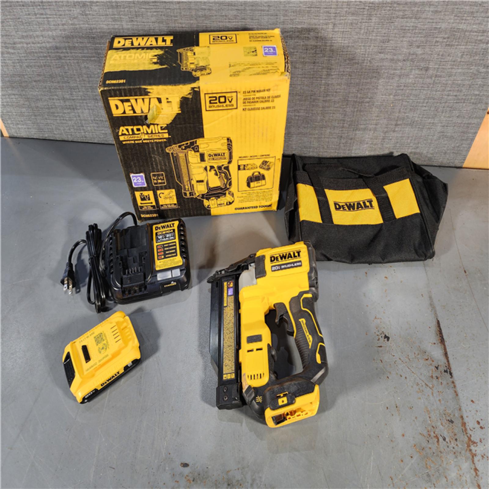 HOUSTON LOCATION - AS-IS DEWALT ATOMIC 20V MAX Lithium Ion Cordless 23 Gauge Pin Nailer Kit with 2.0Ah Battery and Charger