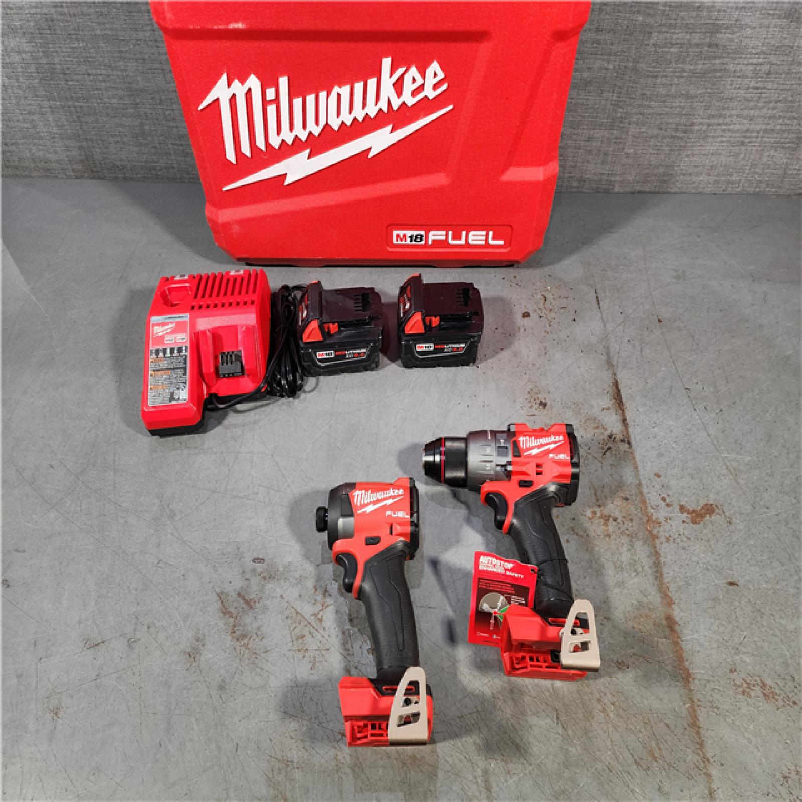 HOUSTON LOCATION - AS-IS Milwaukee M18 FUEL 18V Lithium-Ion Brushless Cordless Hammer Drill and Impact Driver Combo Kit (2-Tool) with 2 Batteries