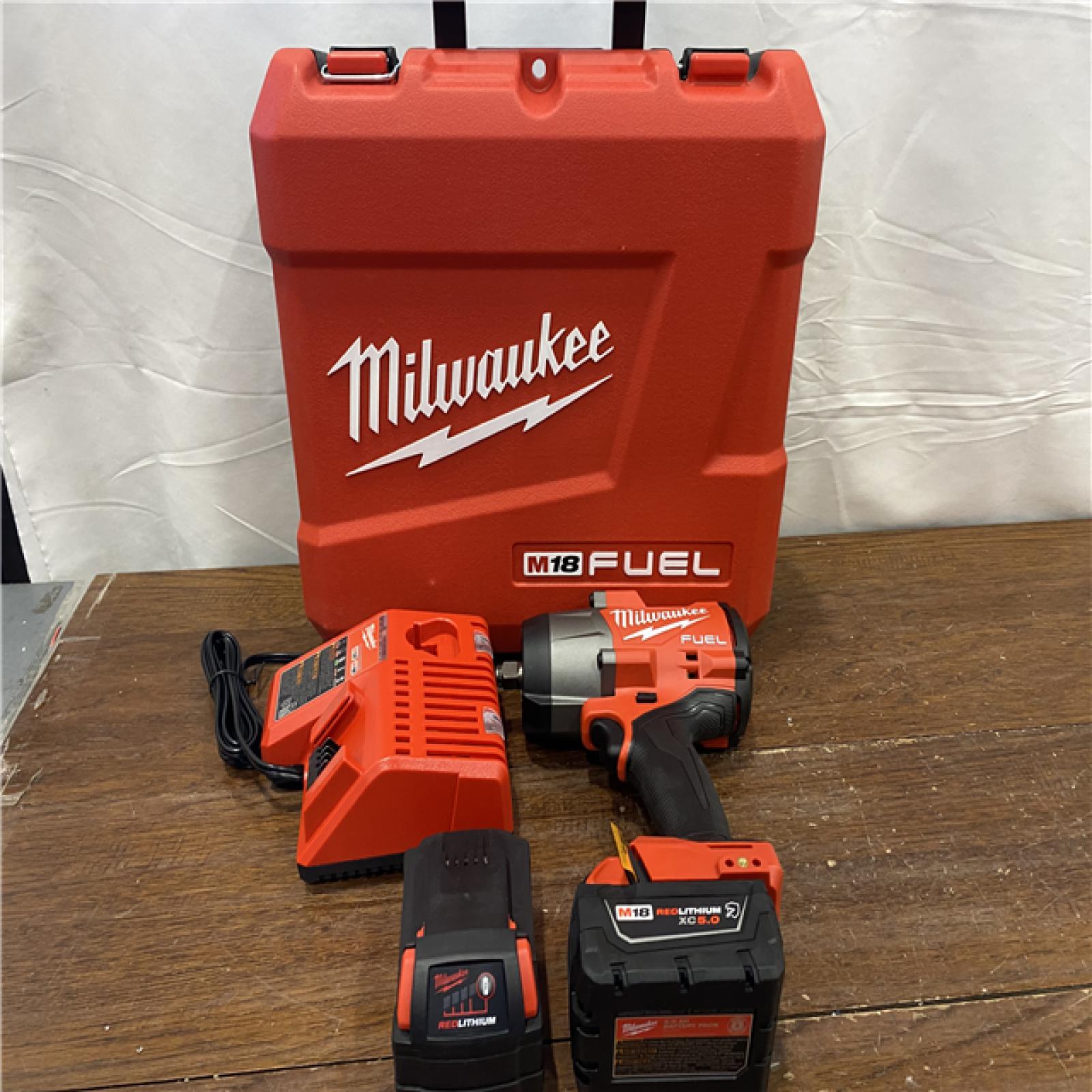 AS-ISMilwaukee M18 FUEL 1/2 in. Cordless Brushless High Torque Impact Wrench Kit (Battery & Charger)