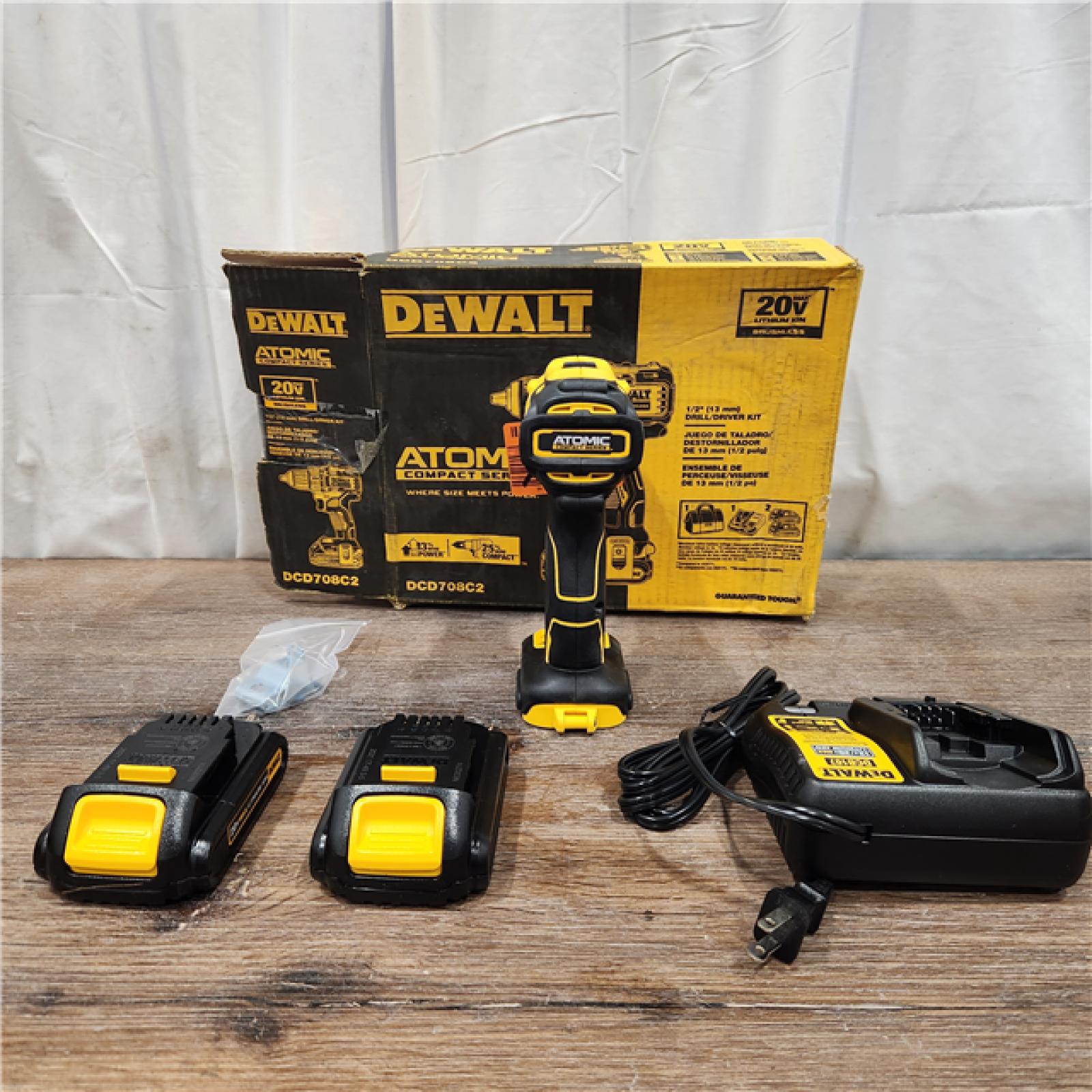 AS IS ATOMIC 20V MAX Cordless Brushless Compact 1/2 in. Drill/Driver, (2) 20V 1.3Ah Batteries, Charger and Bag