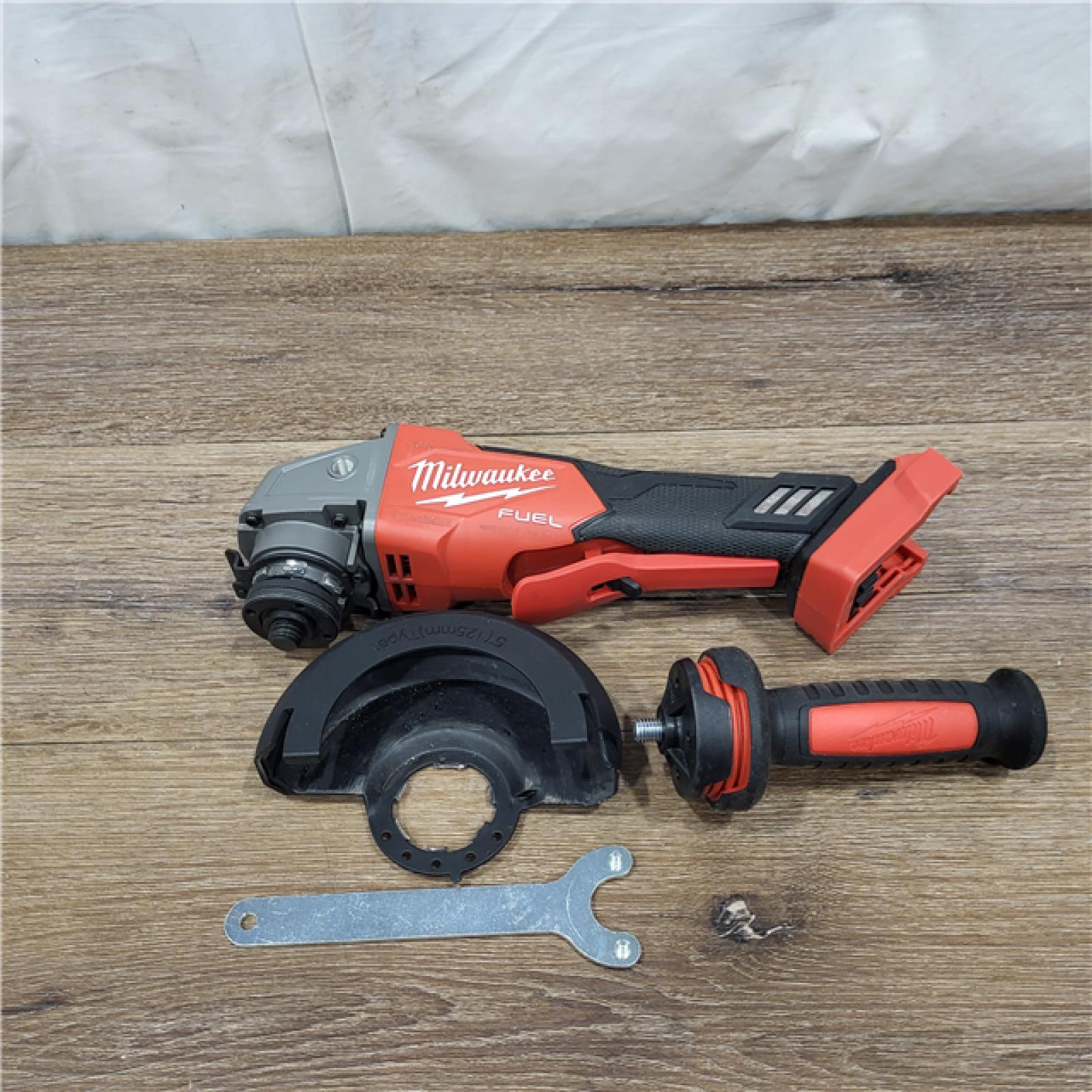 AS-IS Milwaukee 2880-20 M18 FUEL 18-Volt Lithium-Ion Brushless Cordless 4-1/2 in./5 in. Grinder W/Paddle Switch (Tool-Only)