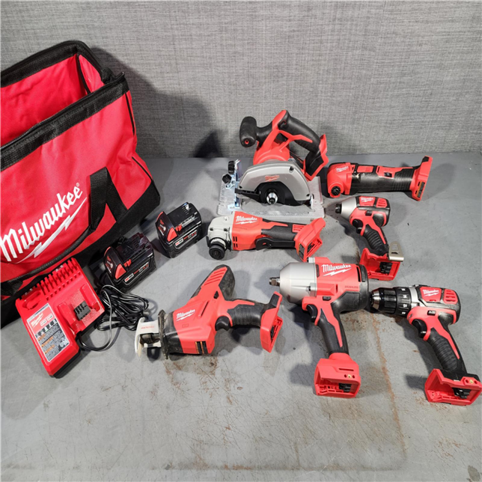 HOUSTON LOCATION - AS-IS M18 18-Volt Lithium-Ion Cordless Combo Kit (7-Tool) with (2) Batteries, Charger, and Tool Bag