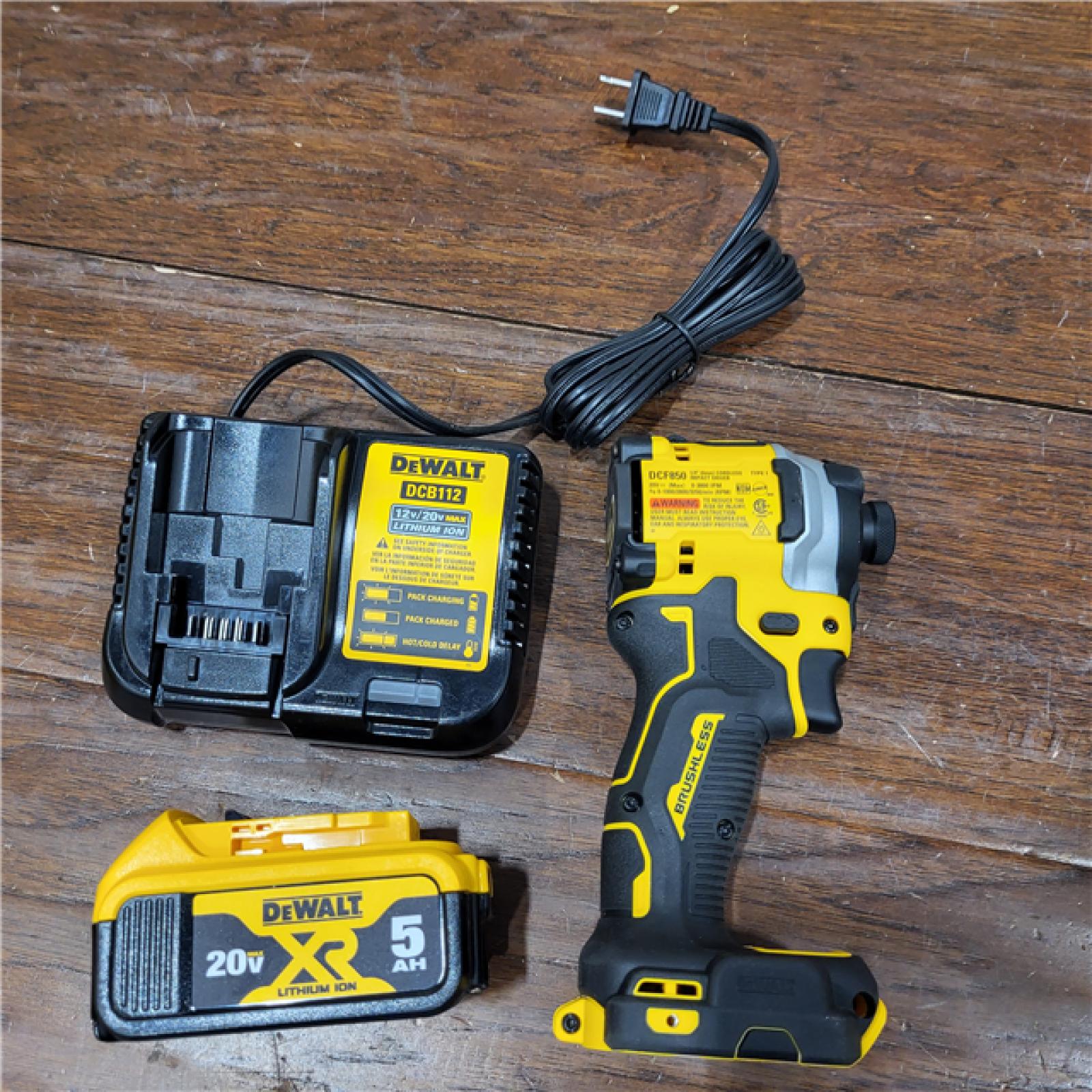 AS-IS DEWALT ATOMIC 20V MAX Lithium-Ion Cordless 1/4 in. Brushless Impact Driver Kit, 5 Ah Battery, Charger, and Bag