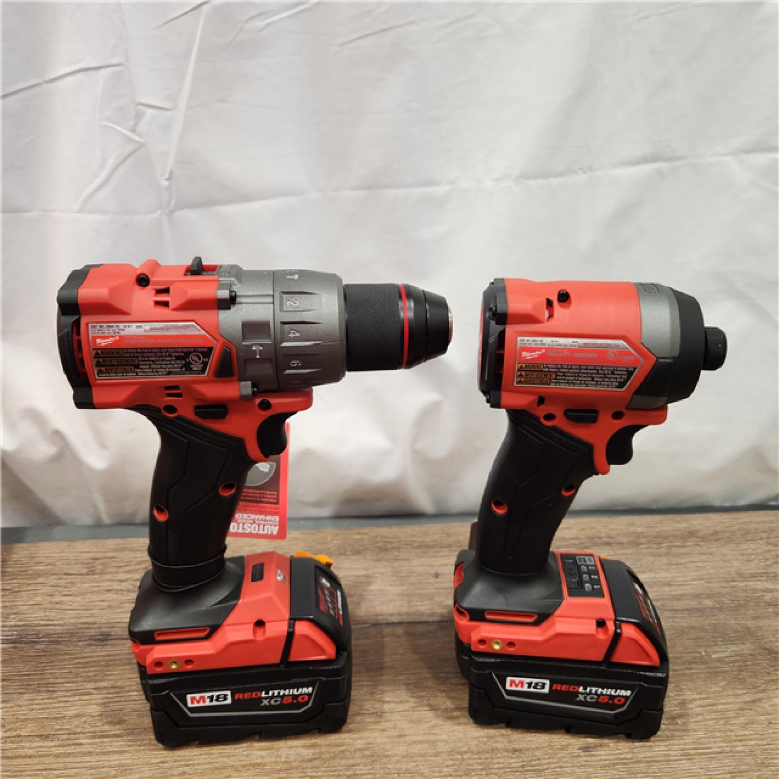 AS-IS Milwaukee M18 FUEL 18V Lithium-Ion Brushless Cordless Hammer Drill and Impact Driver Combo Kit (2-Tool) with 2 Batteries