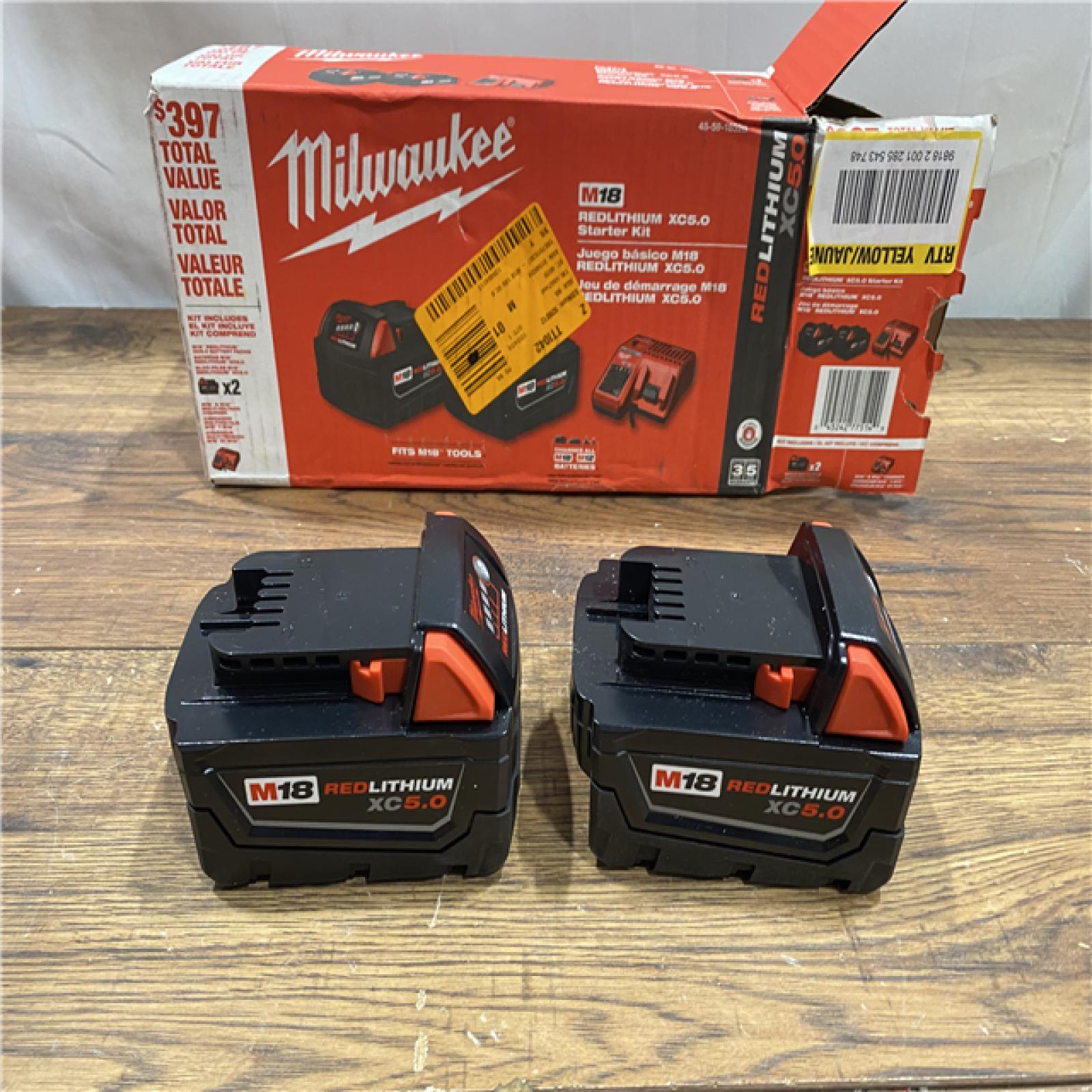 AS IS M18 18-Volt Lithium-Ion XC Starter Kit with Two 5.0Ah Batteries and Charger