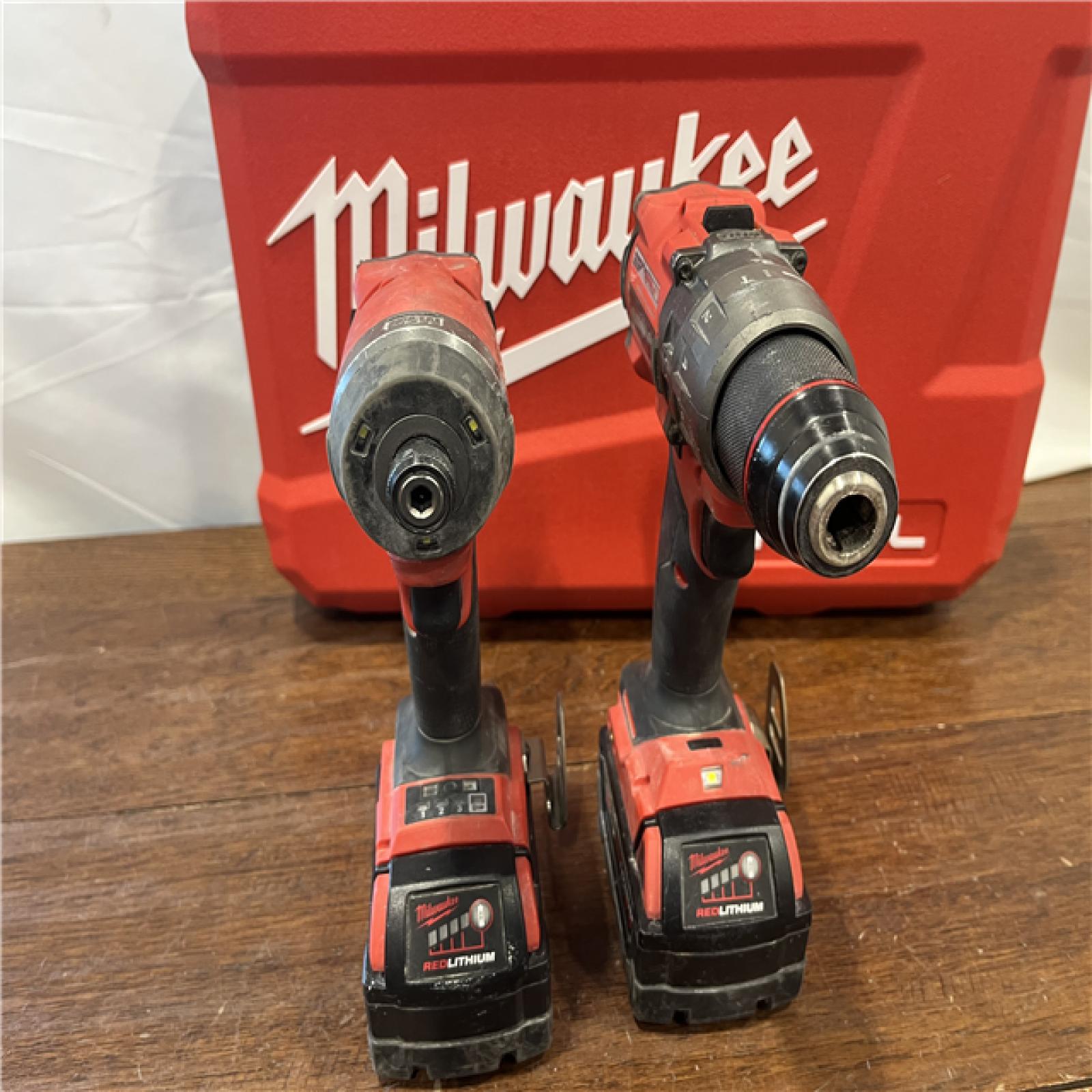 AS-ISMilwaukee M18 FUEL 18V Lithium-Ion Brushless Cordless Hammer Drill and Impact Driver Combo Kit (2-Tool) with 2 Batteries