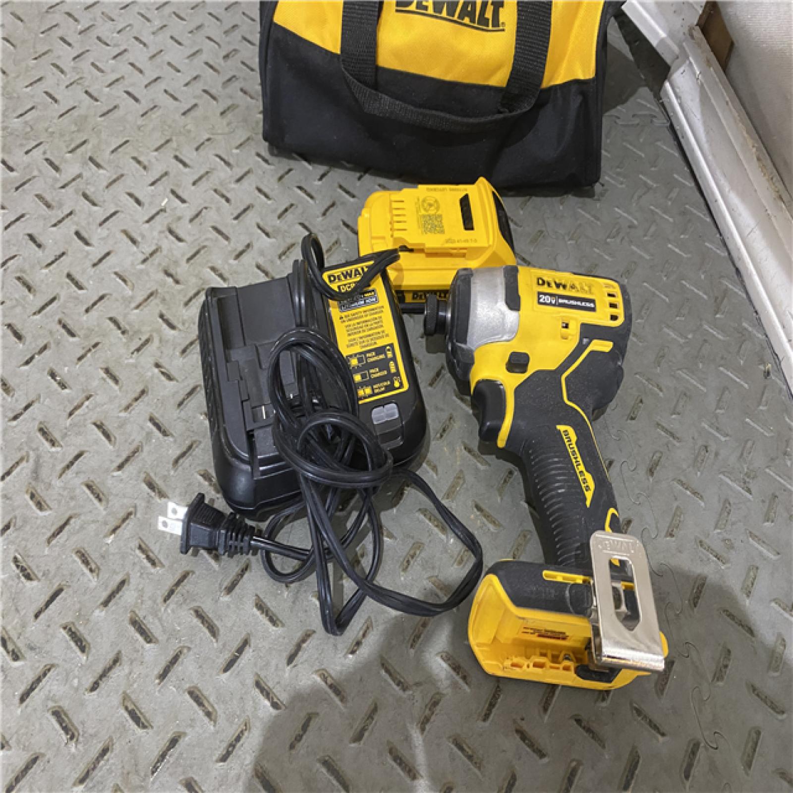 Houston location AS-IS DEWALT ATOMIC 20V MAX* Brushless Cordless Compact 1/4 in. Impact Driver Kit