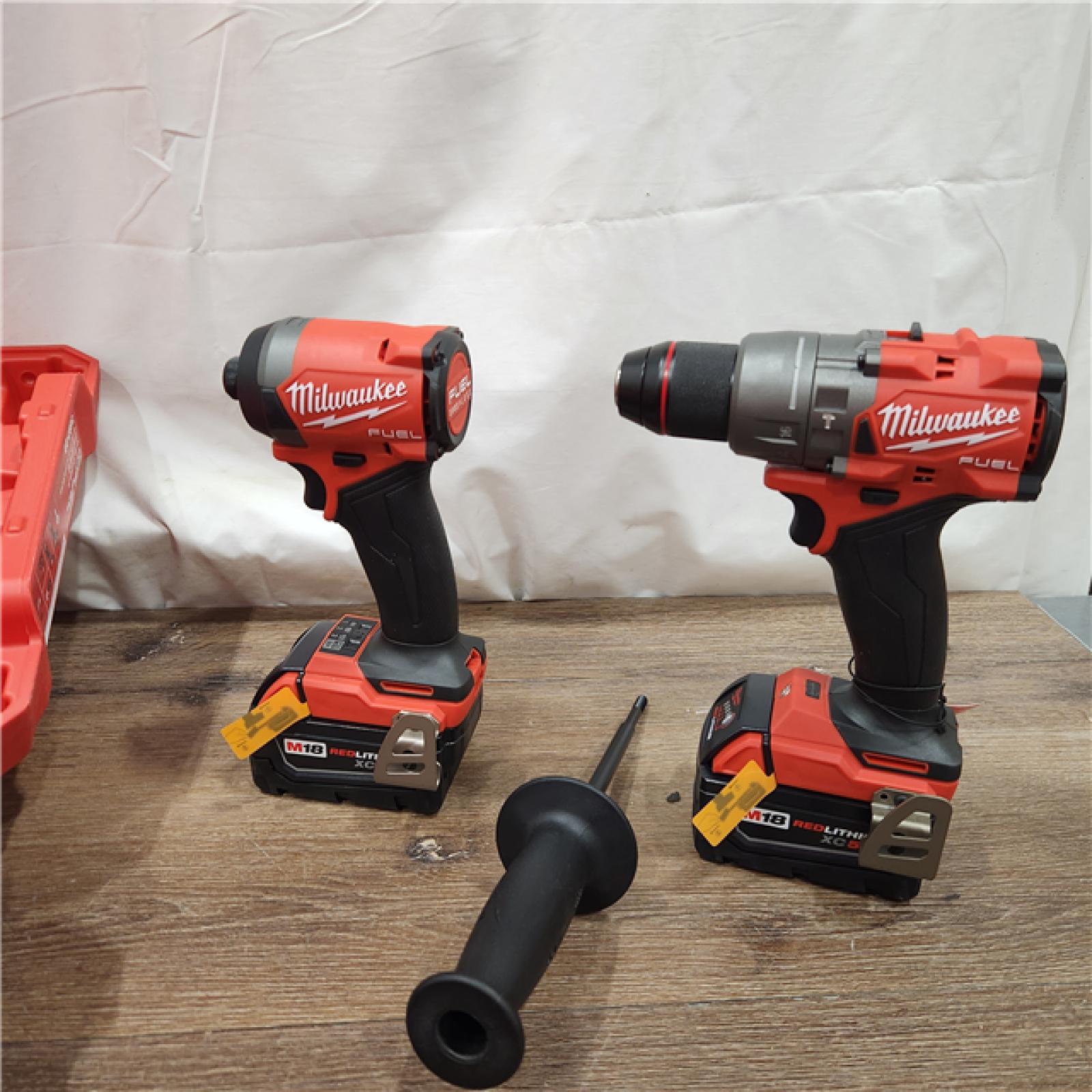 AS-IS Milwaukee 2697-22 M18 18-Volt 1/2-Inch 2-Tool Combo Kit Includes Charger, Battery (2) and Bag