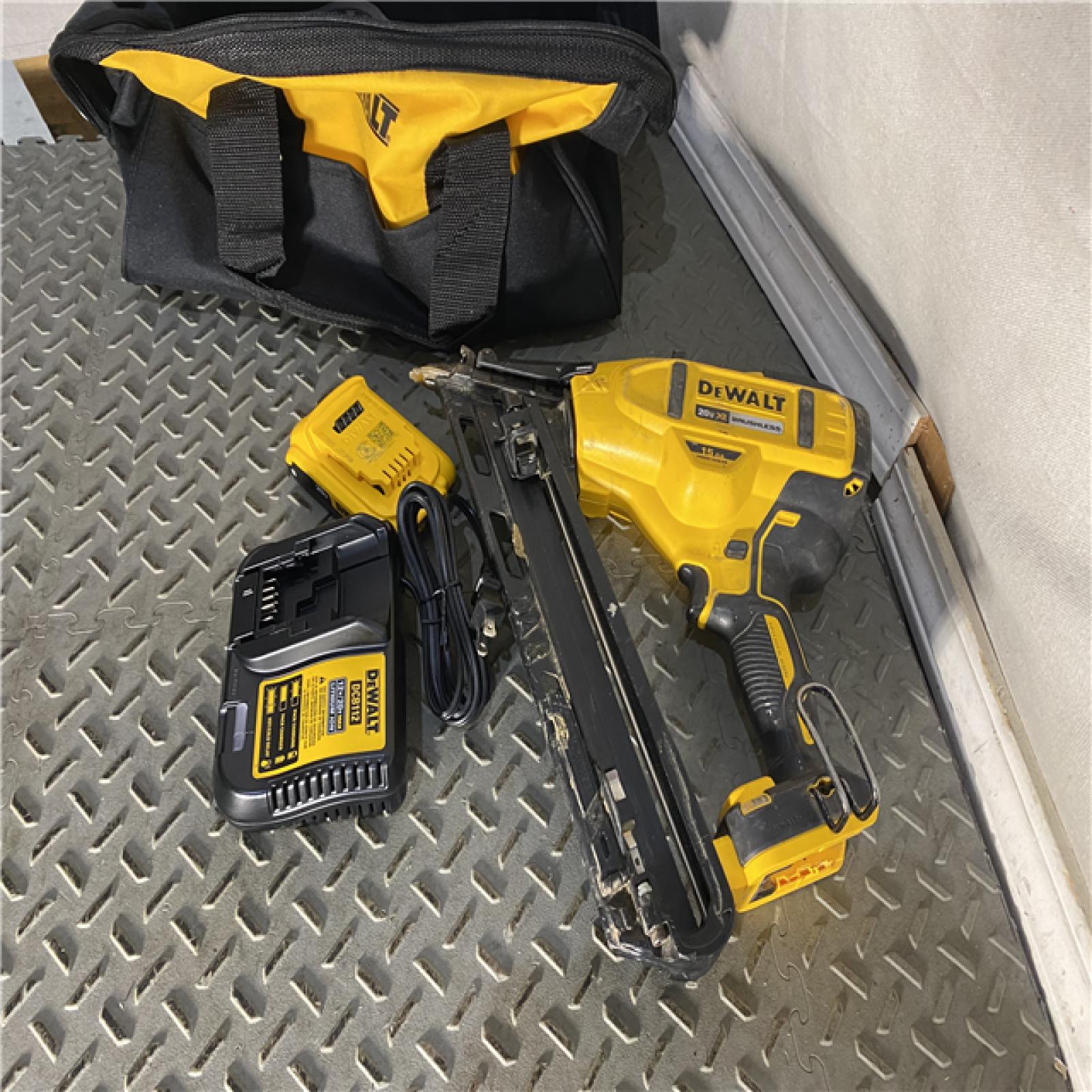 Houston location AS-IS DEWALT 20V MAX XR 15 Ga. Cordless 34 Deg Nailer 20 V