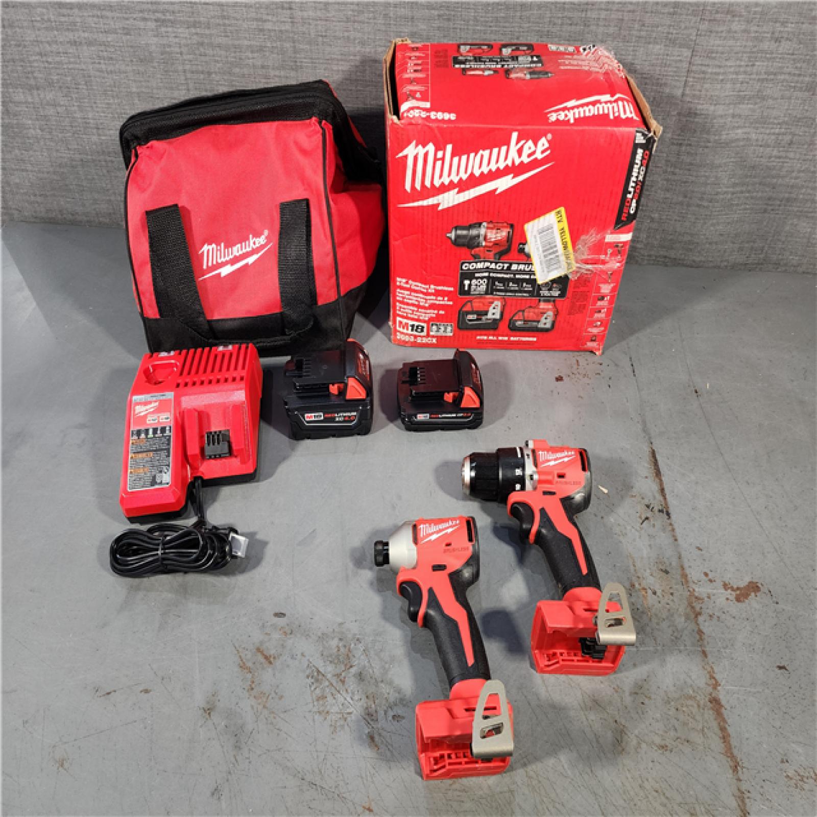 HOUSTON LOCATION - AS-IS (APPEARS LIKE NEW) M18 18-Volt Lithium-Ion Brushless Cordless Compact Hammer Drill/Impact Combo Kit (2-Tool) with (2) Batteries, Bag