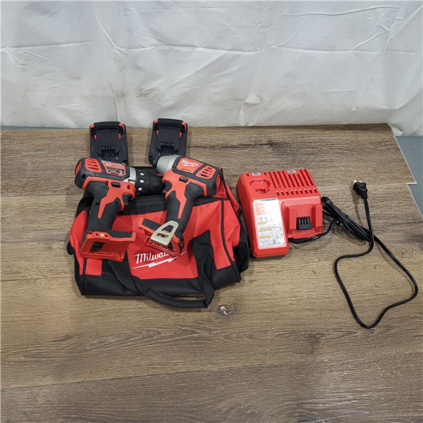 AS-IS Milwaukee M18 18V Cordless Brushed 2 Tool Drill/Driver and Impact Driver Kit