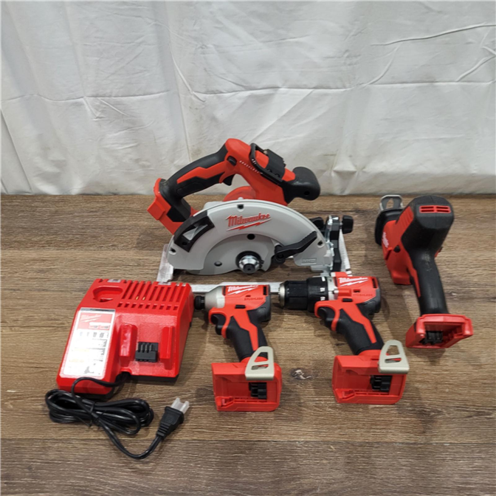 AS-IS Milwaukee M18 18-Volt Lithium-Ion Brushless Cordless Combo Kit (4-Tool) with 2-Batteries, 1-Charger and Tool Bag