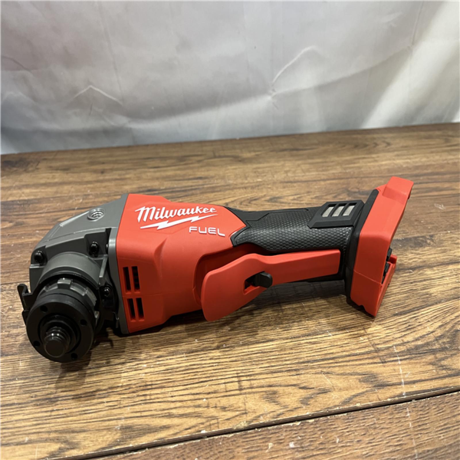 AS-IS Milwaukee 2880-20 M18 FUEL 18-Volt Lithium-Ion Brushless Cordless 4-1/2 in./5 in. Grinder W/Paddle Switch (Tool-Only)