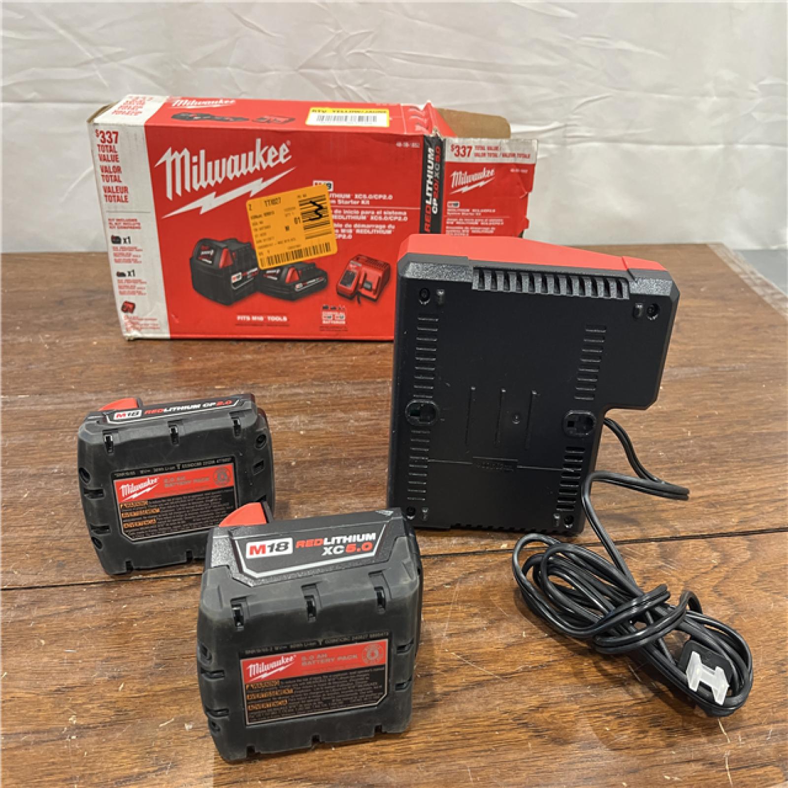 AS-IS Milwaukee M18 Redlithium Xc5.0 Resistant Battery Starter Kit