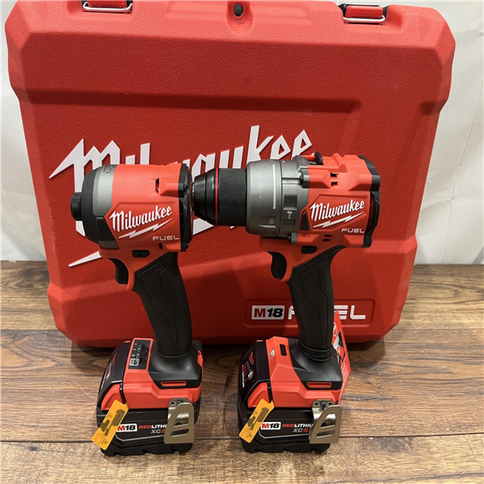 AS IS Milwaukee M18 FUEL 18V Lithium-Ion Brushless Cordless Hammer Drill and Impact Driver Combo Kit (2-Tool) with 2 Batteries