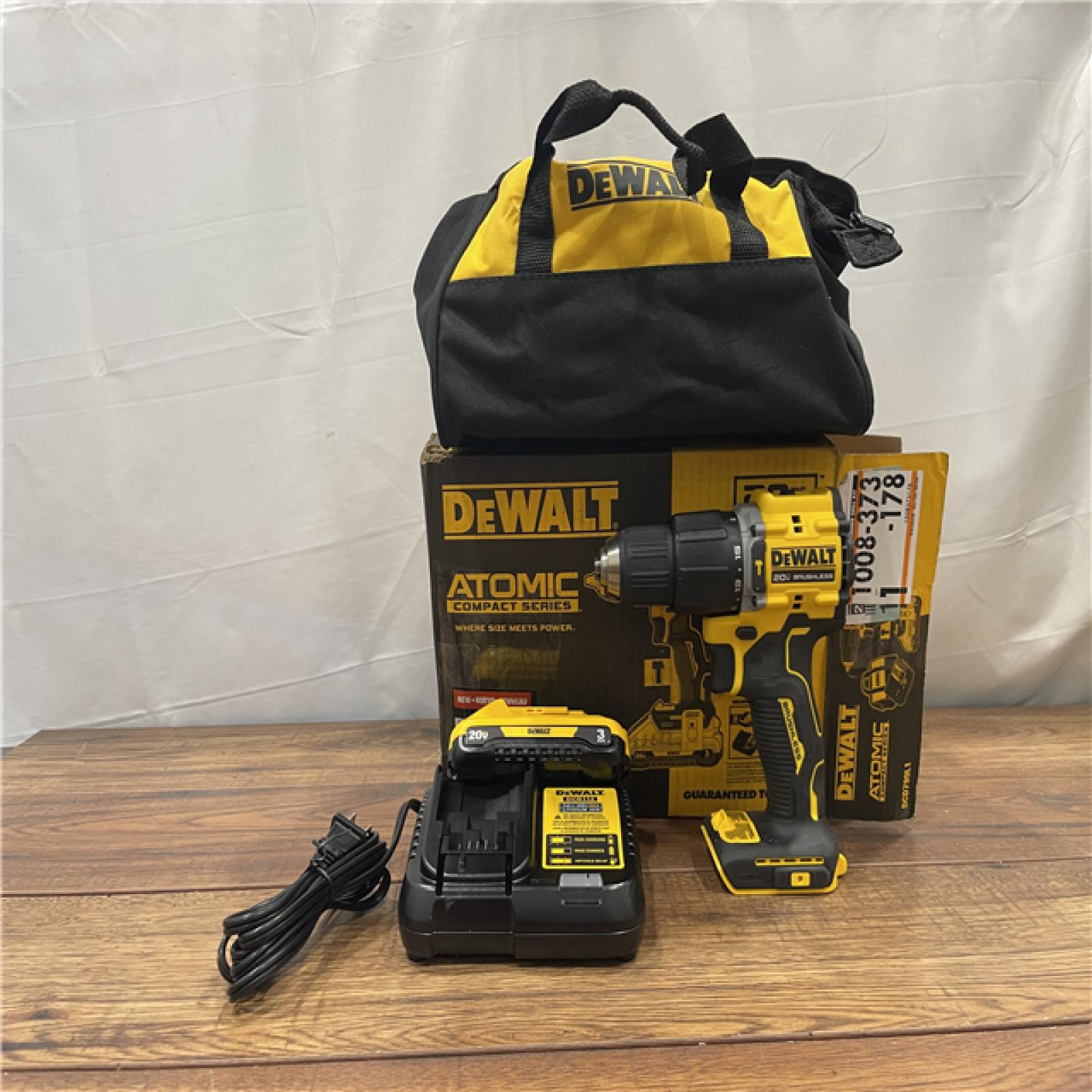 AS-IS DeWalt 20V MAX ATOMIC 1/2 in. Brushless Cordless Hammer Drill Kit