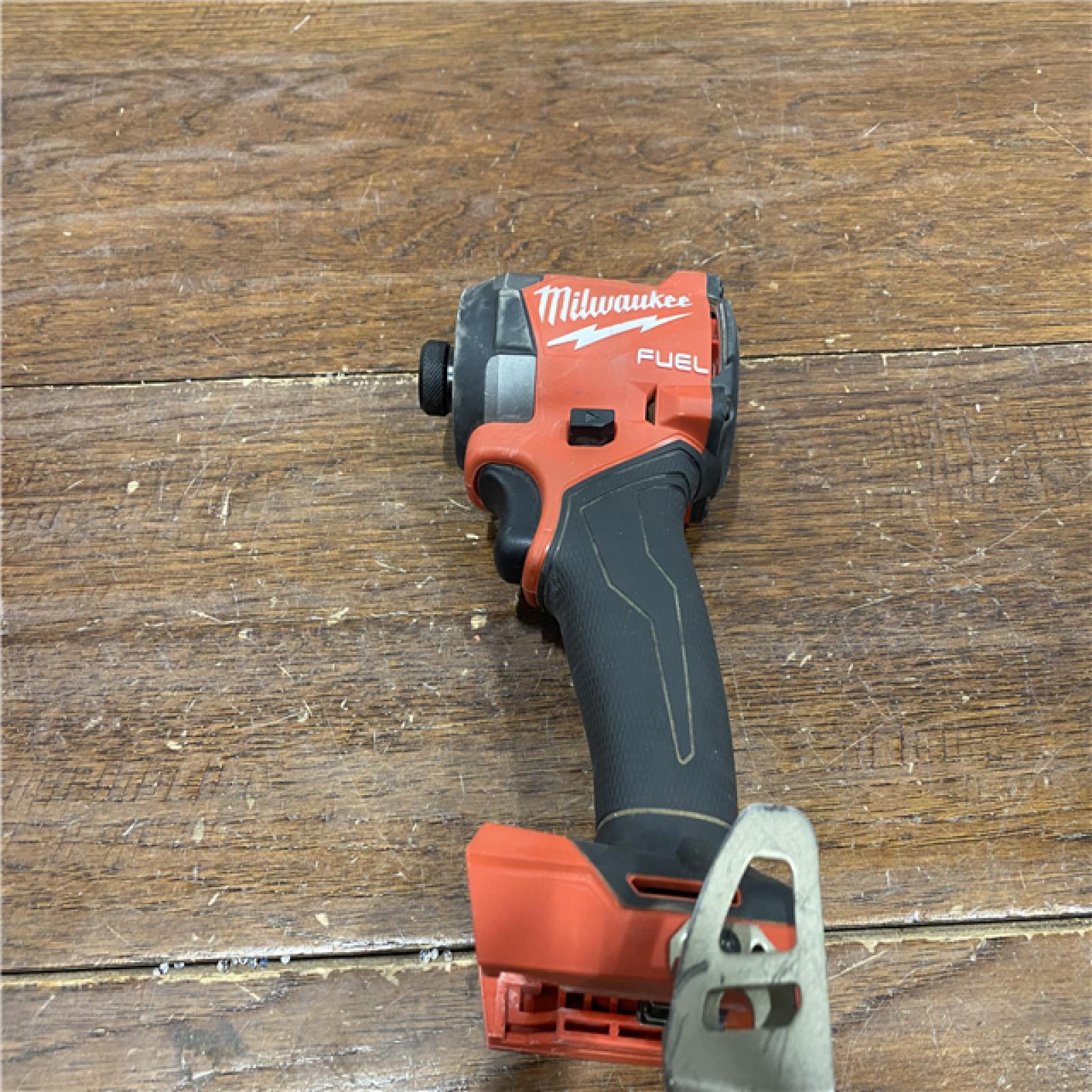 AS-ISMilwaukee 2953-20 18V Lithium-Ion Brushless Cordless 1/4   Hex Impact Driver Bare Tool  Red