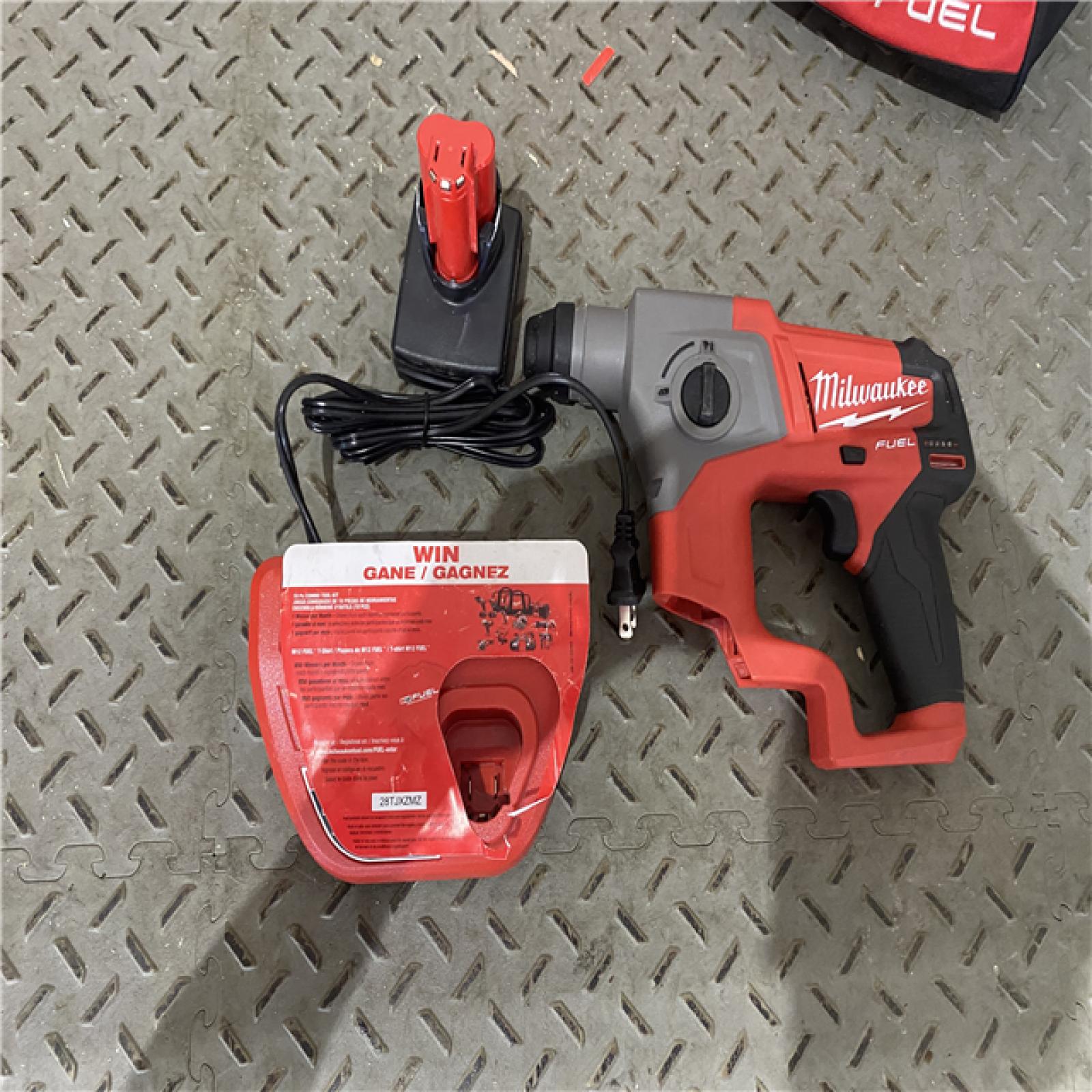 Houston location AS-IS MILWAUKEE M12 FUEL 12V Lithium-Ion Brushless Cordless 5/8 in. SDS-Plus Rotary Hammer Kit with One 4.0Ah Battery and Bag