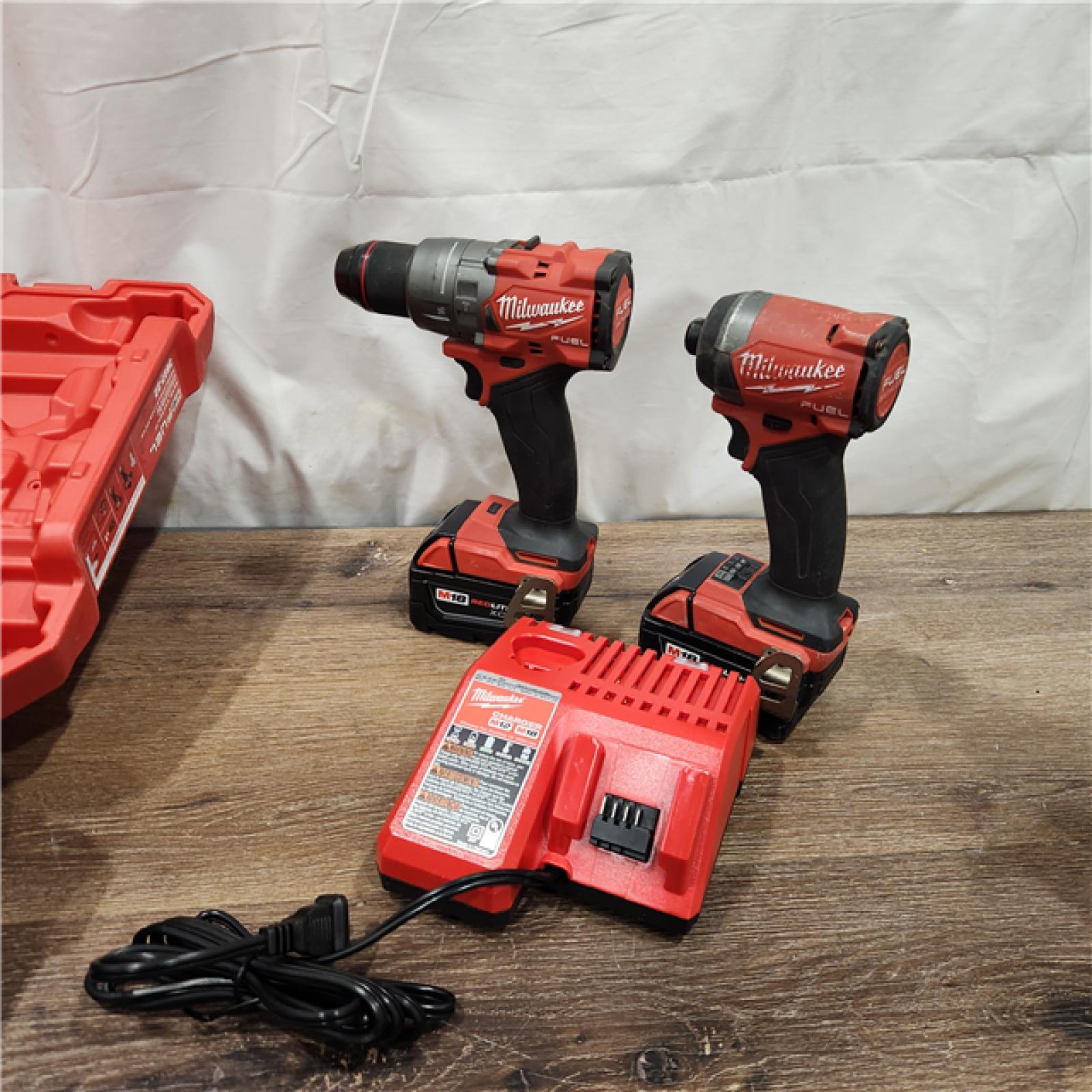 AS-IS Milwaukee M18 FUEL 18V Lithium-Ion Brushless Cordless Hammer Drill and Impact Driver Combo Kit (2-Tool) with 2 Batteries