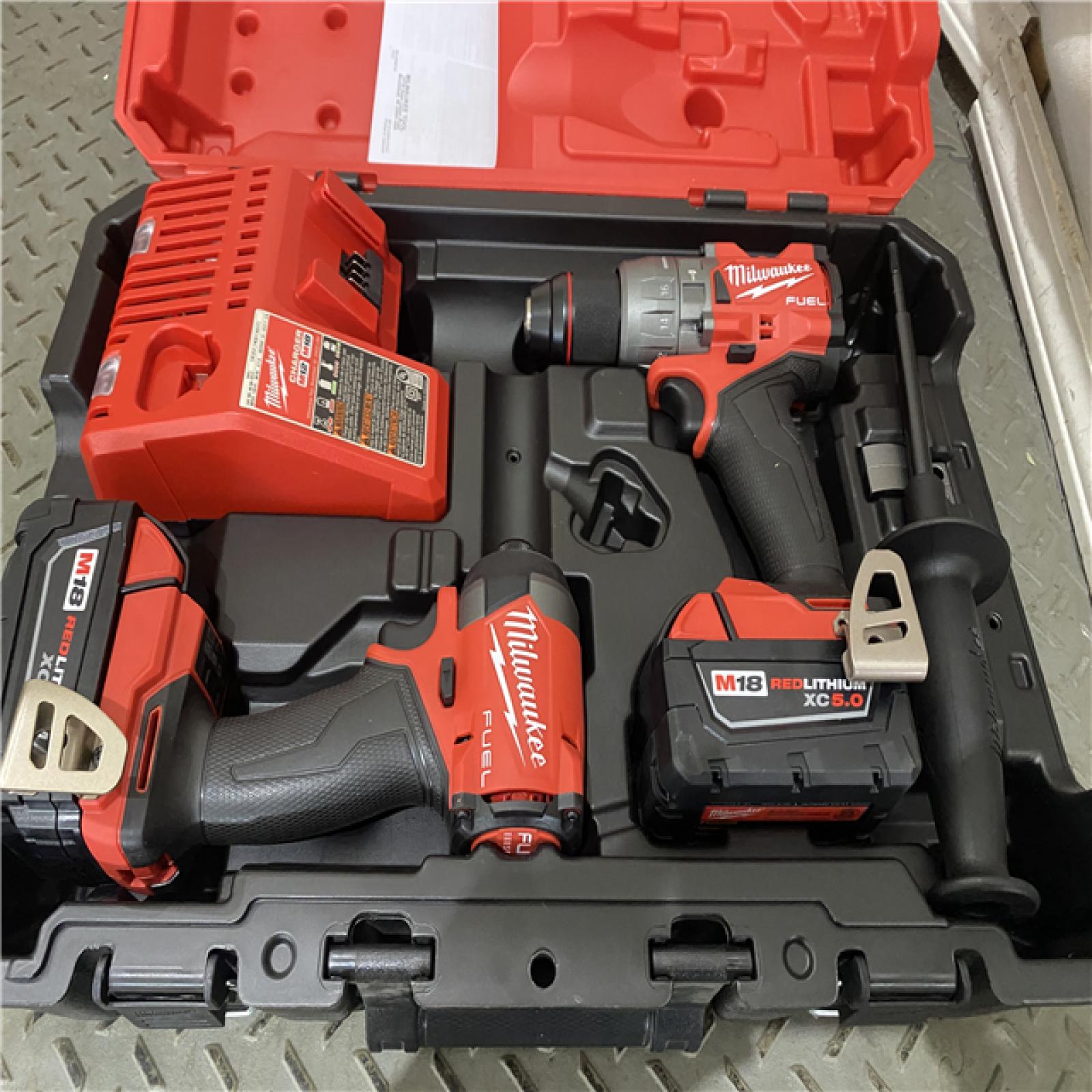 Houston location AS-IS MILWAUKEE M18 FUEL 18V Lithium-Ion Brushless Cordless Hammer Drill and Impact Driver Combo Kit (2-Tool) with 2 Batteries