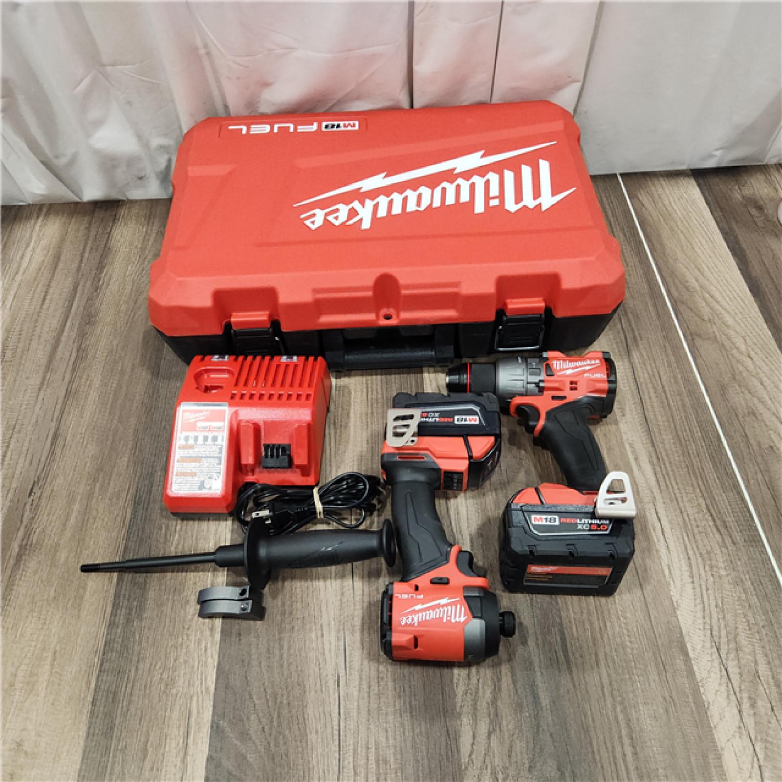 AS IS Milwaukee M18 FUEL 18V Lithium-Ion Brushless Cordless Hammer Drill and Impact Driver Combo Kit (2-Tool) with 2 Batteries