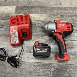 AS-IS MILWAUKEE M18 18-Volt Lithium-Ion Cordless 1/2 in. Impact Wrench W/ Friction Ring W/ (1) 5.0Ah Battery and Charger