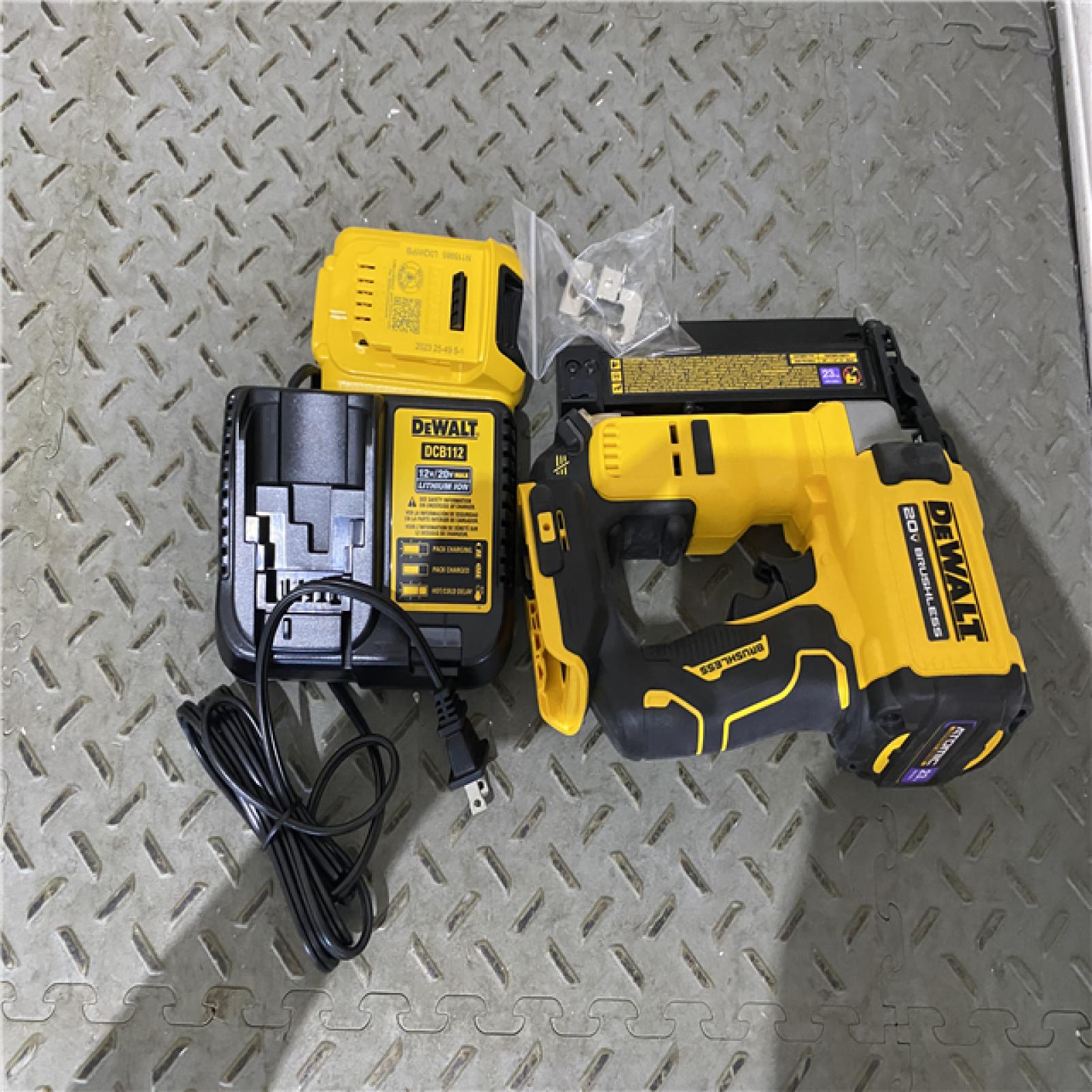 Houston location AS-IS DEWALT ATOMIC 20V MAX Lithium Ion Cordless 23 Gauge Pin Nailer Kit with 2.0Ah Battery and Charger