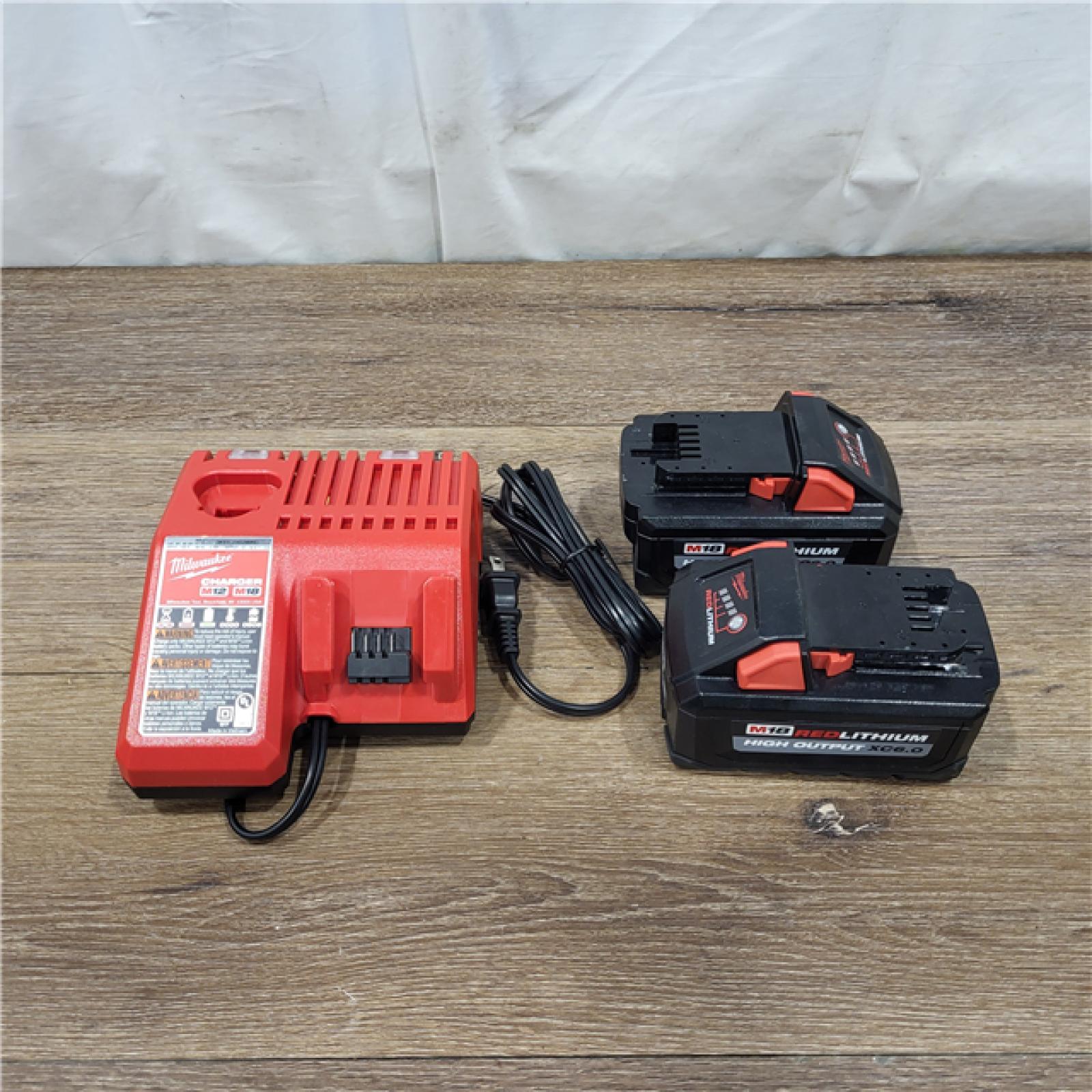 AS-IS Milwaukee M18 18-Volt Lithium-Ion High Output Starter Kit with Two 6.0 Ah Battery and Charger