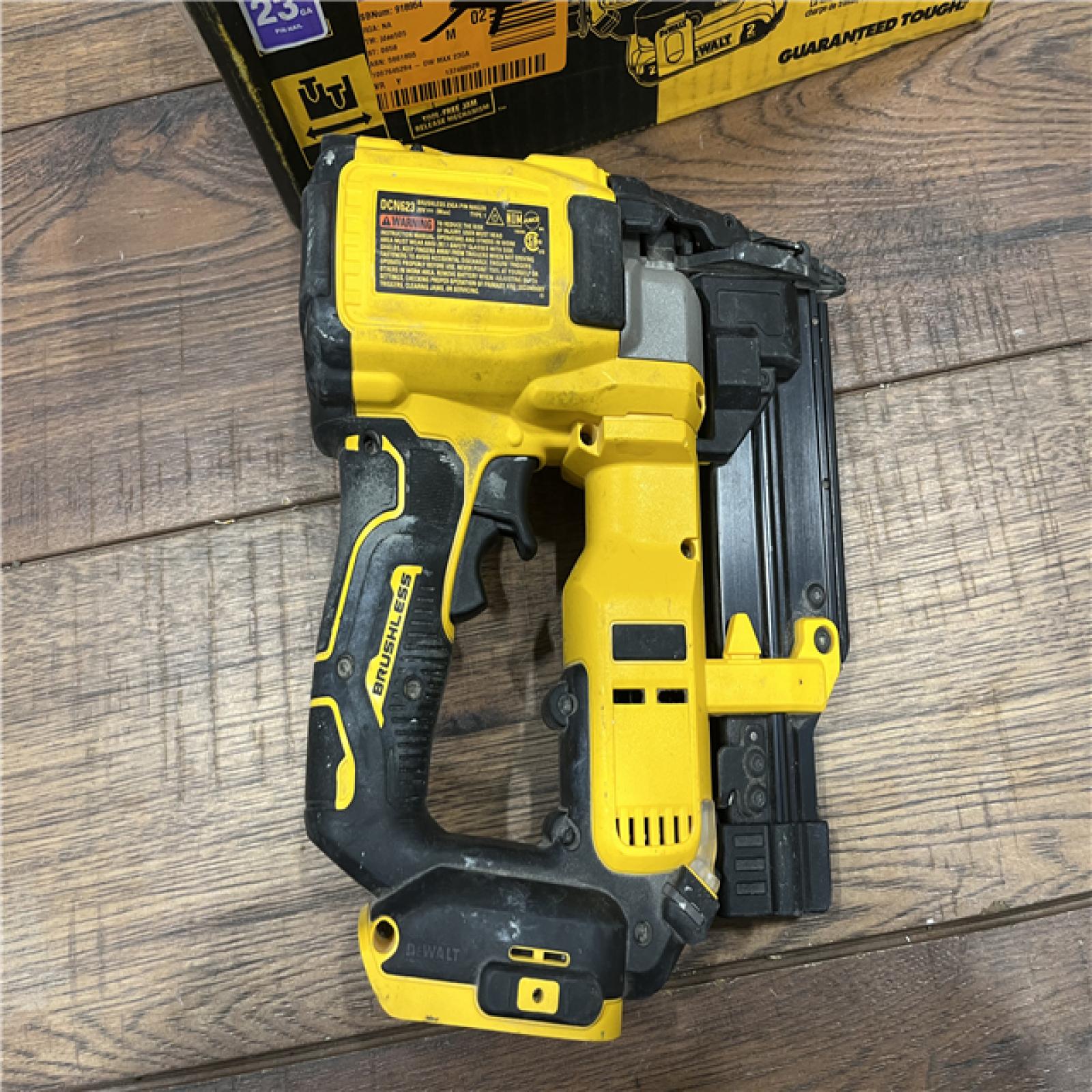 AS-IS DEWALT ATOMIC 20V MAX Lithium Ion Cordless 23 Gauge Pin Nailer Kit with 2.0Ah Battery and Charger