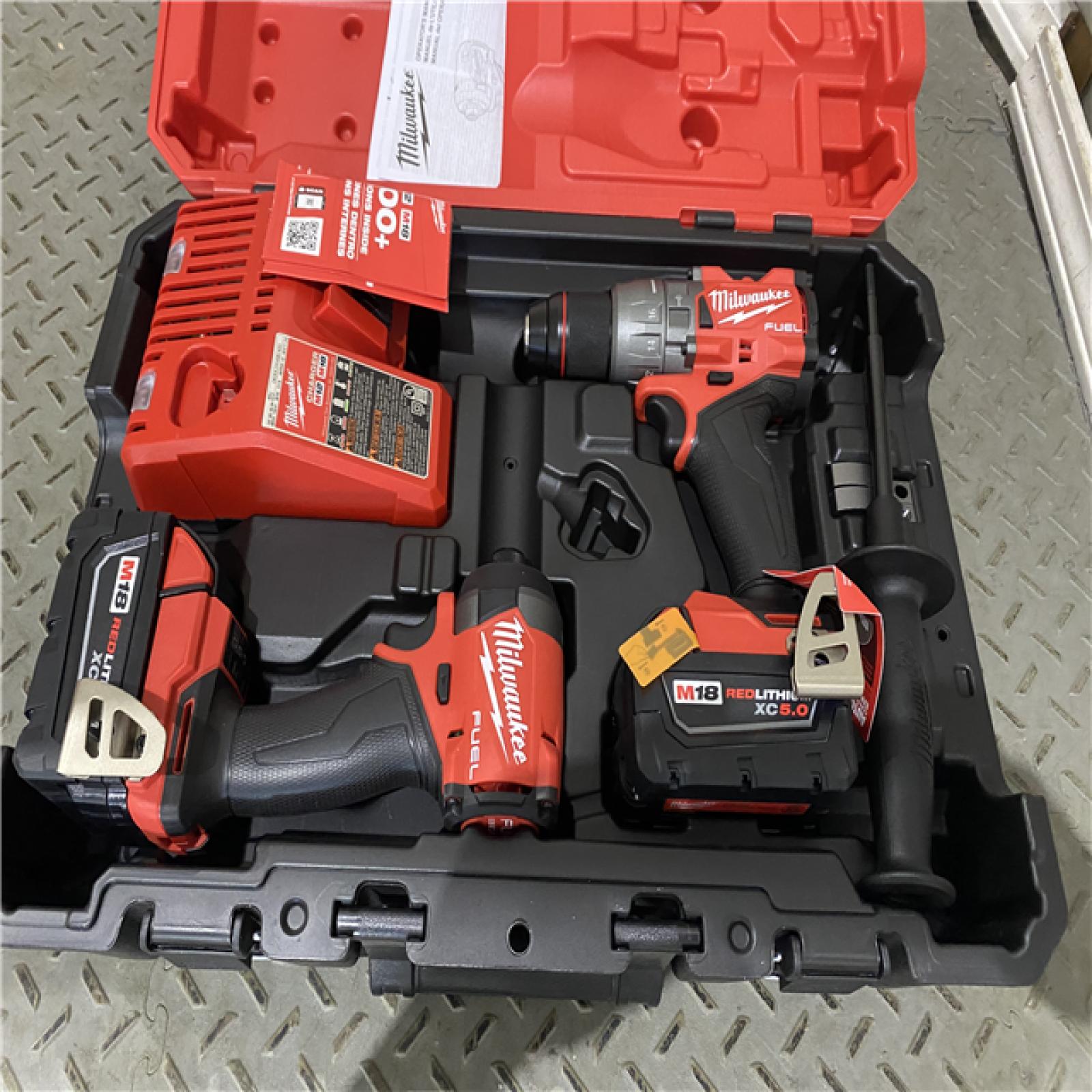 Houston location AS-IS MILWAUKEE M18 FUEL 18V Lithium-Ion Brushless Cordless Hammer Drill and Impact Driver Combo Kit (2-Tool) with 2 Batteries