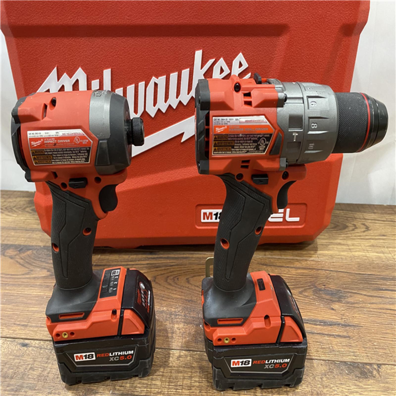 AS IS Milwaukee M18 FUEL 18V Lithium-Ion Brushless Cordless Hammer Drill and Impact Driver Combo Kit (2-Tool) with 2 Batteries