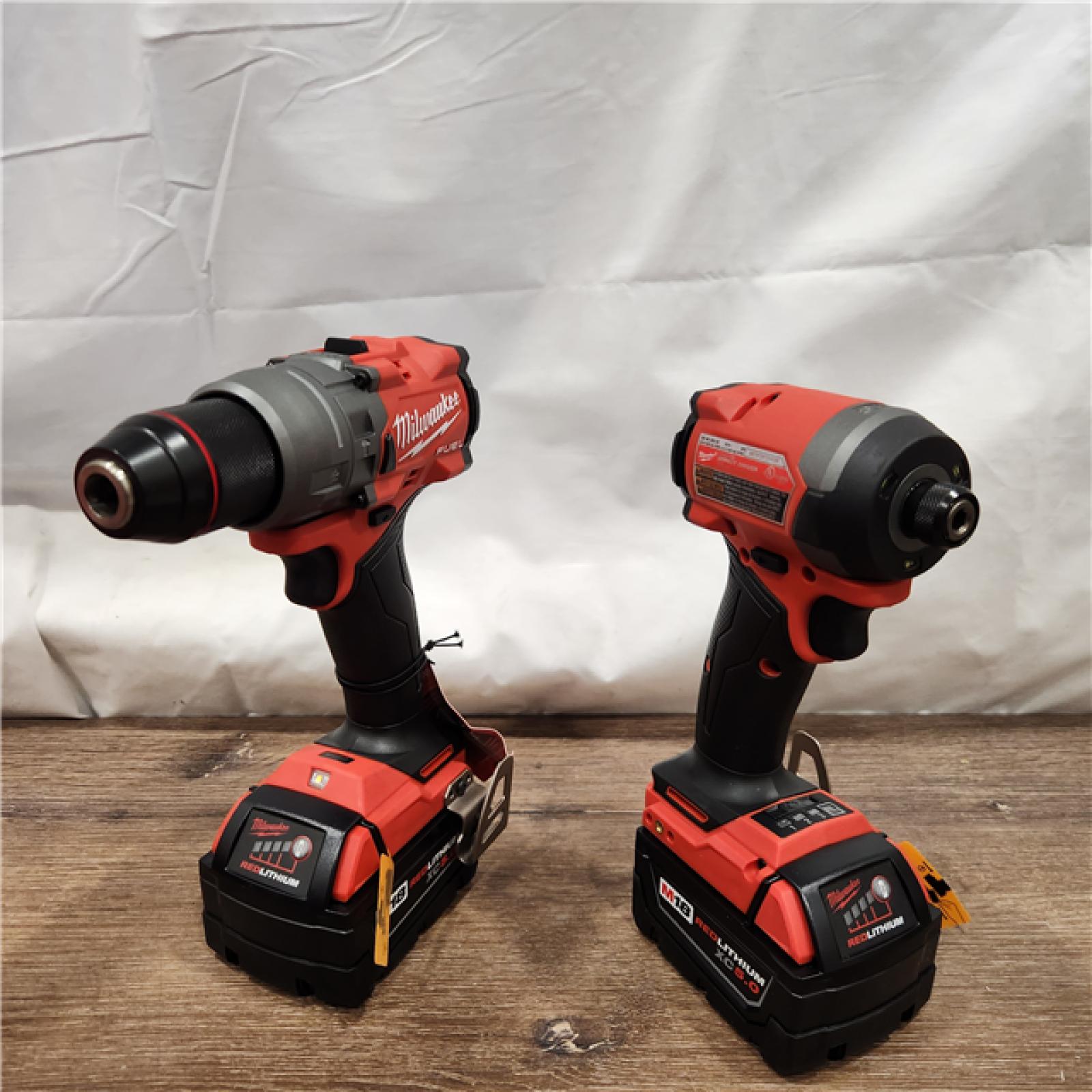 AS-IS Milwaukee M18 FUEL 18V Lithium-Ion Brushless Cordless Hammer Drill and Impact Driver Combo Kit (2-Tool) with 2 Batteries