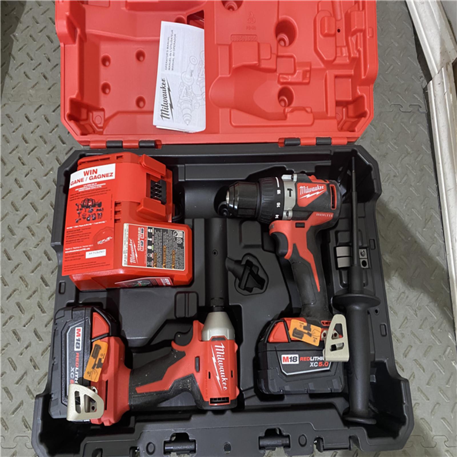 Houston location AS-IS MILWAUKEE M18 FUEL 18V Lithium-Ion Brushless Cordless Hammer Drill and Impact Driver Combo Kit (2-Tool) with 2 Batteries