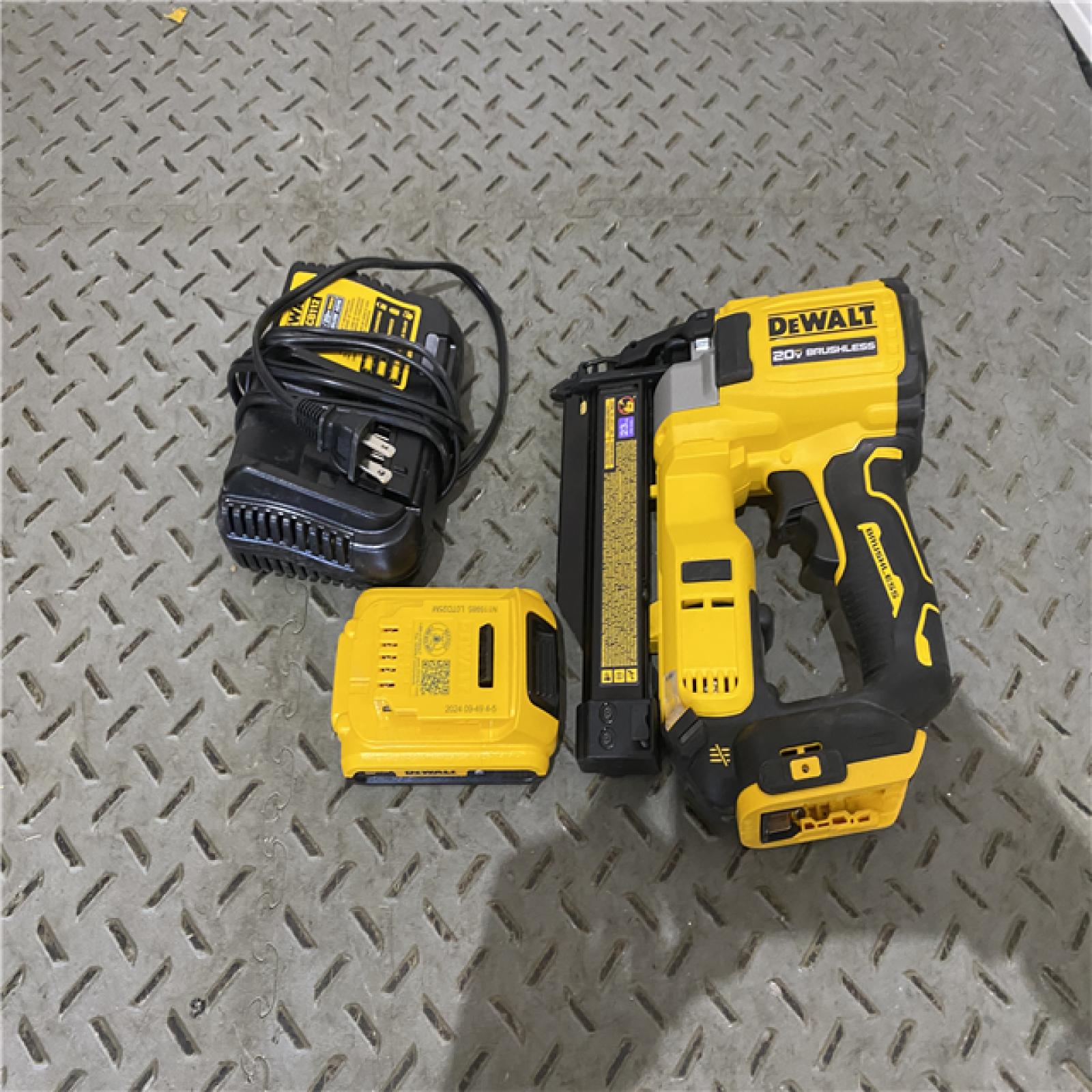 Houston location AS-IS DEWALT ATOMIC 20V MAX Lithium Ion Cordless 23 Gauge Pin Nailer Kit with 2.0Ah Battery and Charger