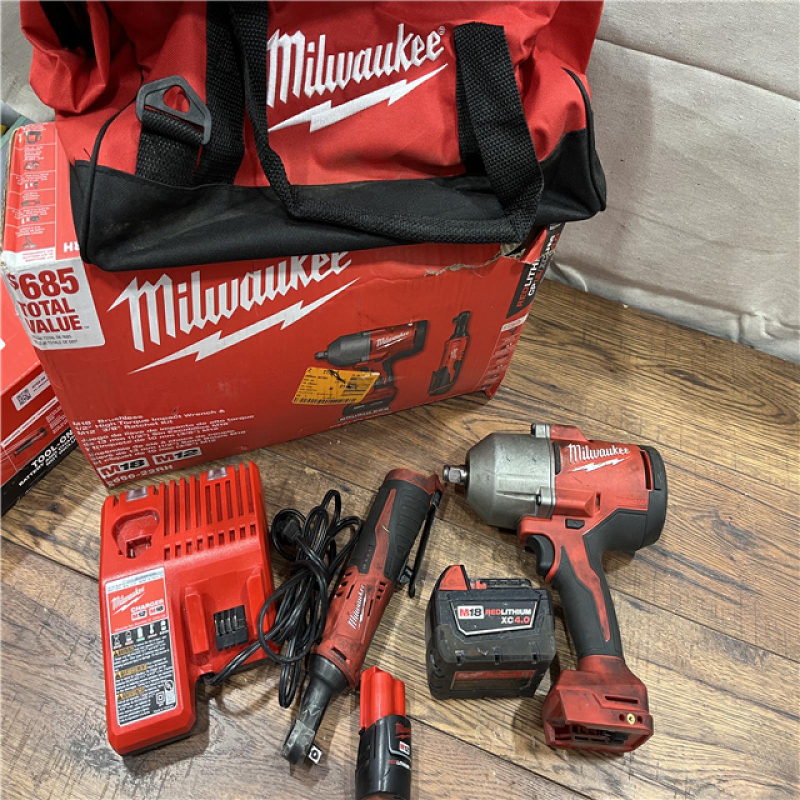 AS-IS Milwaukee M12/M18 12/18V Lithium-Ion Cordless 3/8 in. Ratchet and 1/2 in. High Torque Impact Wrench with Friction Ring Combo Kit