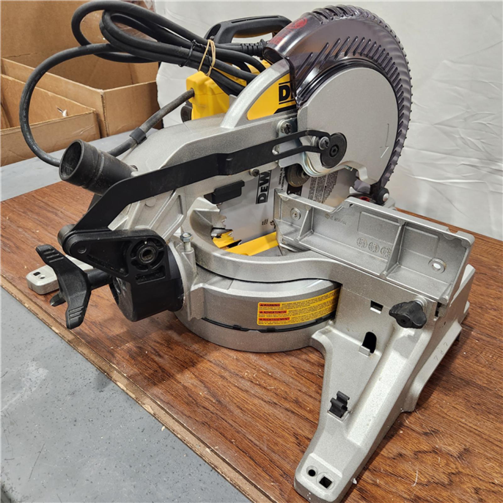 AS-IS  DEWALT 15 Amp Corded 10 in. Compound Single Bevel Miter Saw