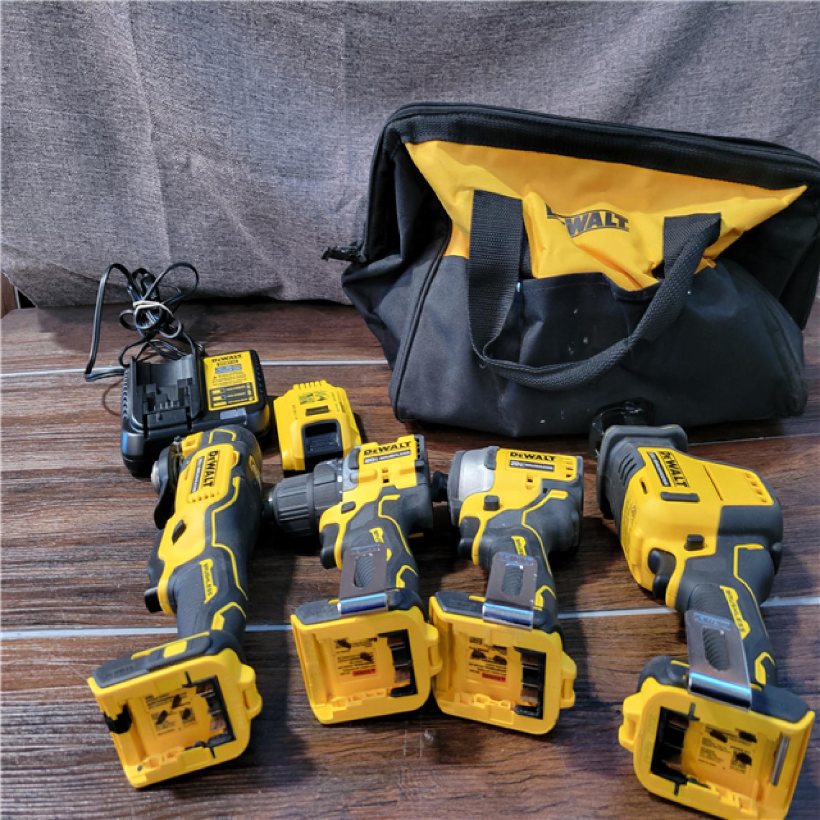 California As-Is Dewalt Brushless 4-Tool Combo Kit (Battery,Charger, and Tool Bag Included)