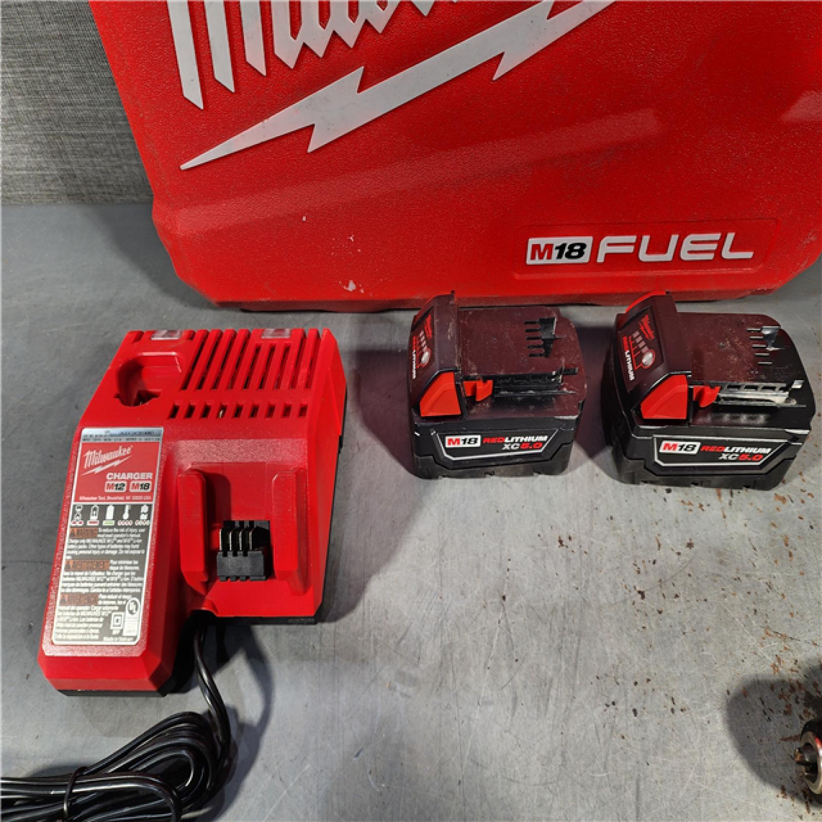 HOUSTON LOCATION - AS-IS Milwaukee M18 FUEL 18V Lithium-Ion Brushless Cordless Hammer Drill and Impact Driver Combo Kit (2-Tool) with 2 Batteries