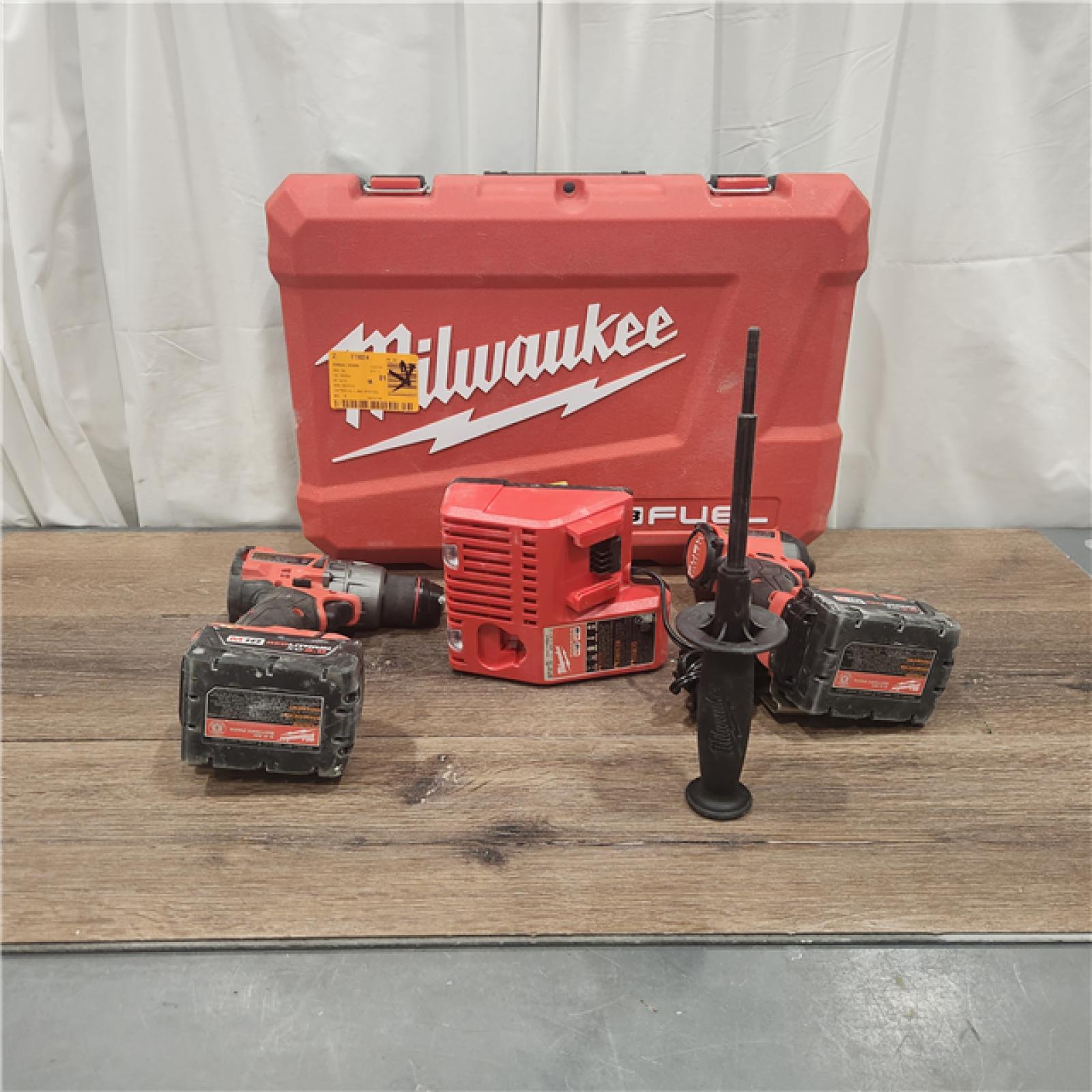 AS IS Milwaukee M18 FUEL 18V Lithium-Ion Brushless Cordless Hammer Drill and Impact Driver Combo Kit (2-Tool) with 2 Batteries