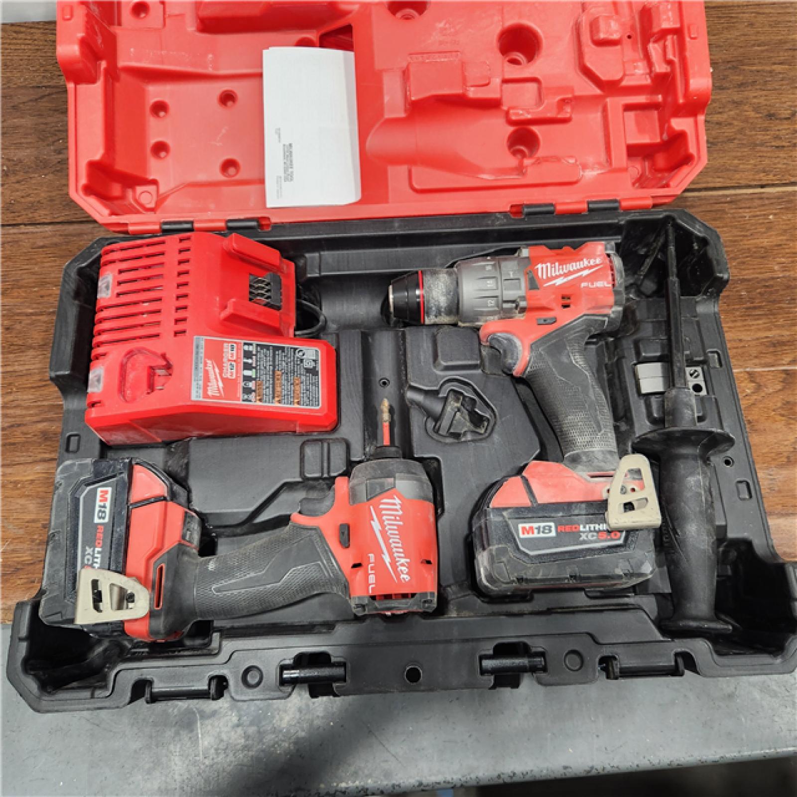 AS-IS M18 FUEL 18V Lithium-Ion Brushless Cordless Hammer Drill and Impact Driver Combo Kit (2-Tool) with 2 Batteries