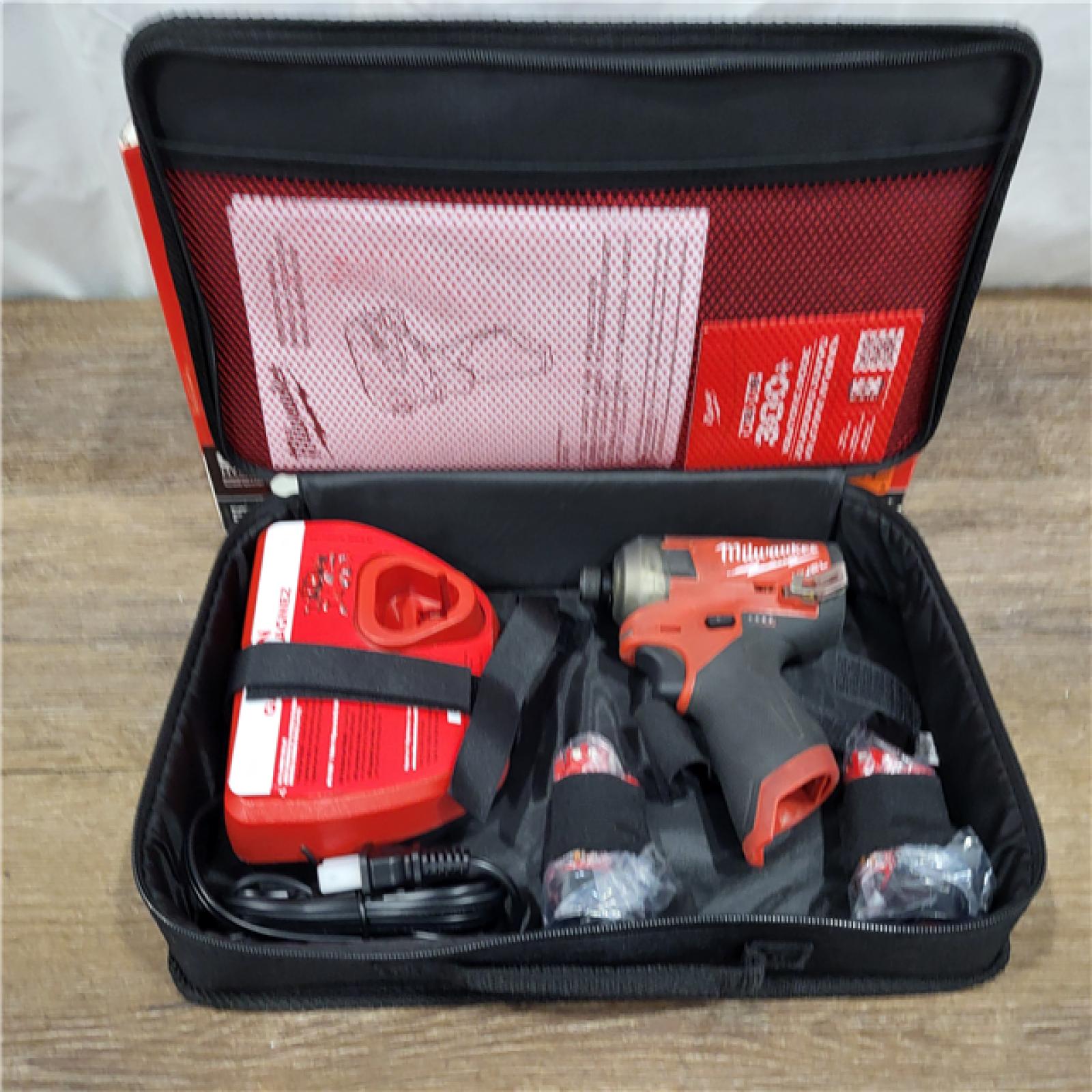 AS-IS M12 FUEL SURGE 12V Lithium-Ion Brushless Cordless 1/4 in. Hex Impact Driver Compact Kit W/Two 2.0Ah Batteries, Bag