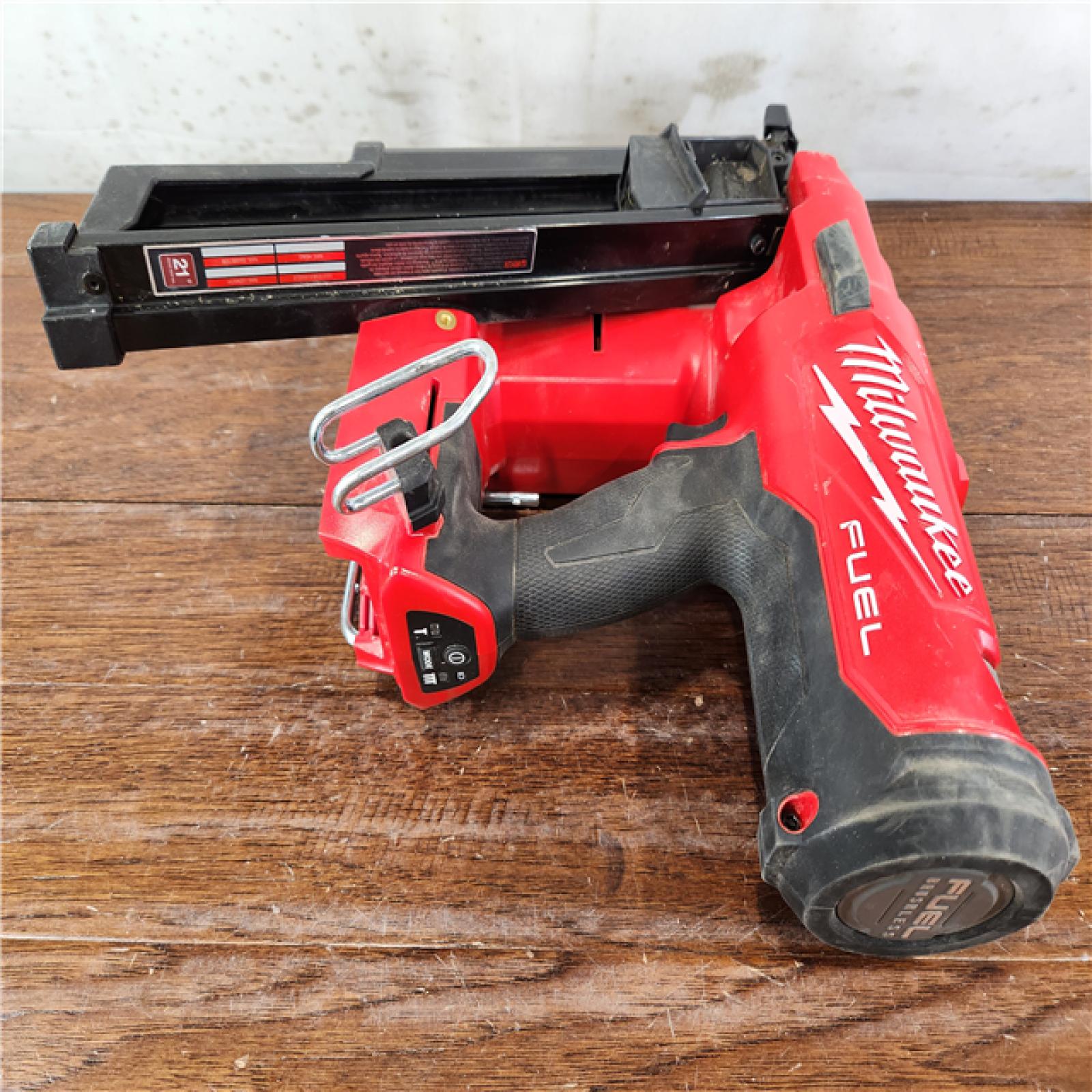 AS-IS Milwaukee M18 FUEL Lithium-Ion Brushless Cordless 3-1/2 in. 21-Degree Framing Nailer (Tool-Only)