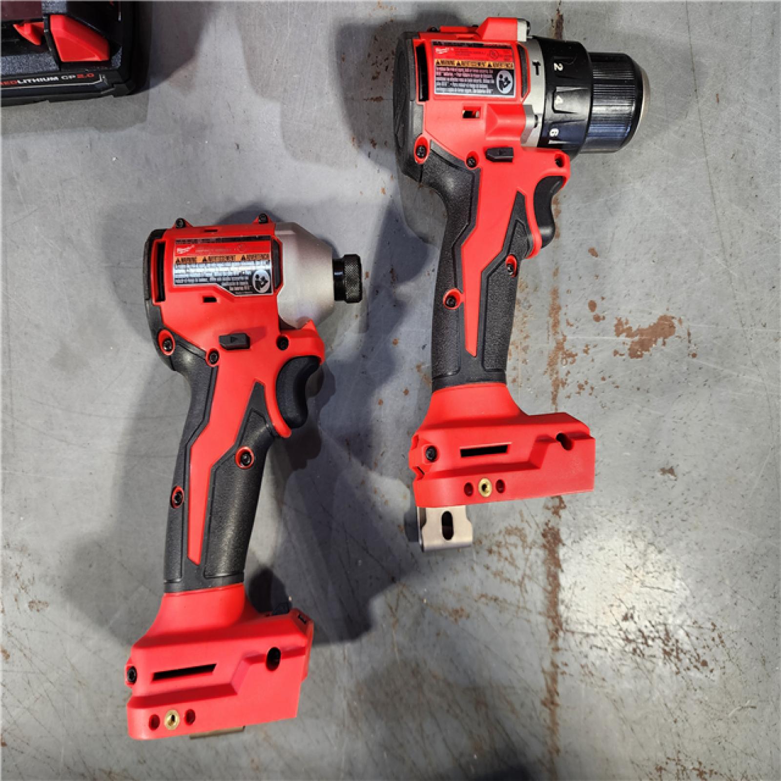 HOUSTON LOCATION - AS-IS M18 18-Volt Lithium-Ion Brushless Cordless Compact Hammer Drill/Impact Combo Kit (2-Tool) with (2) Batteries, Bag